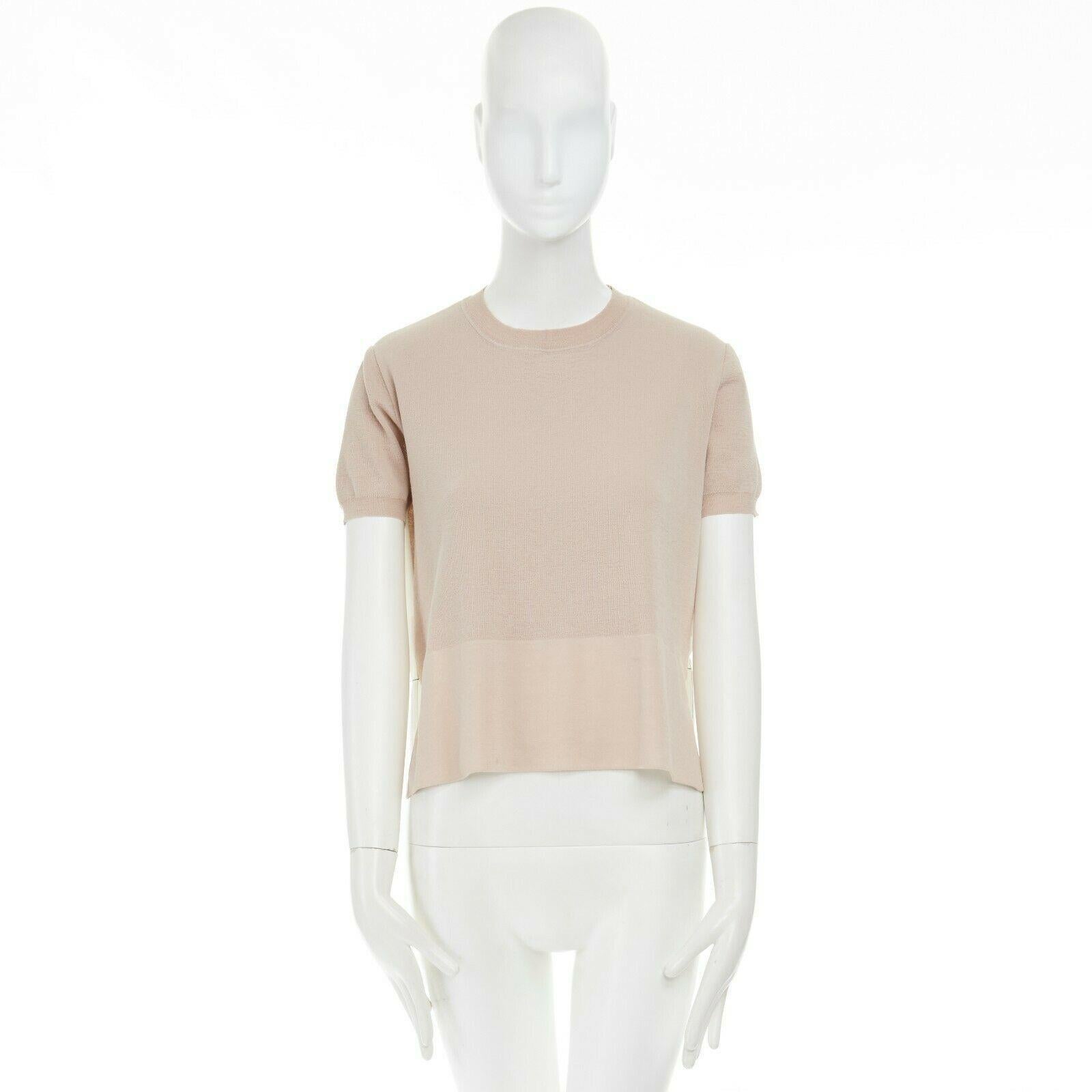 MARNI nude knitted front contrast white striped back short sleeve sweater top XS 
Reference: LNKO/A01063 
Brand: Marni 
Color: Pink 
Pattern: Striped 
Extra Detail: Light beige. Contrasting color at front hem. Round neck. Short sleeve. Contrast back