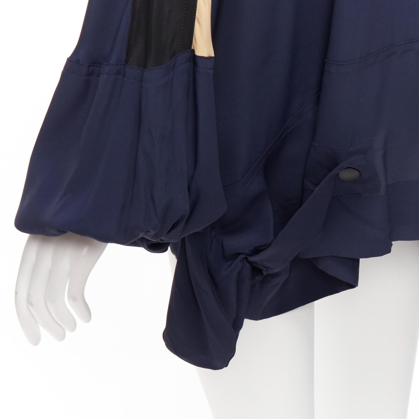 MARNI nude navy black acetate silk colorblock panelled track top IT36 XXS
Reference: CELG/A00423
Brand: Marni
Material: Acetate, Silk
Color: Nude, Navy
Pattern: Solid
Closure: Zip
Extra Details: Half zip front.
Made in: Italy

CONDITION:
Condition: