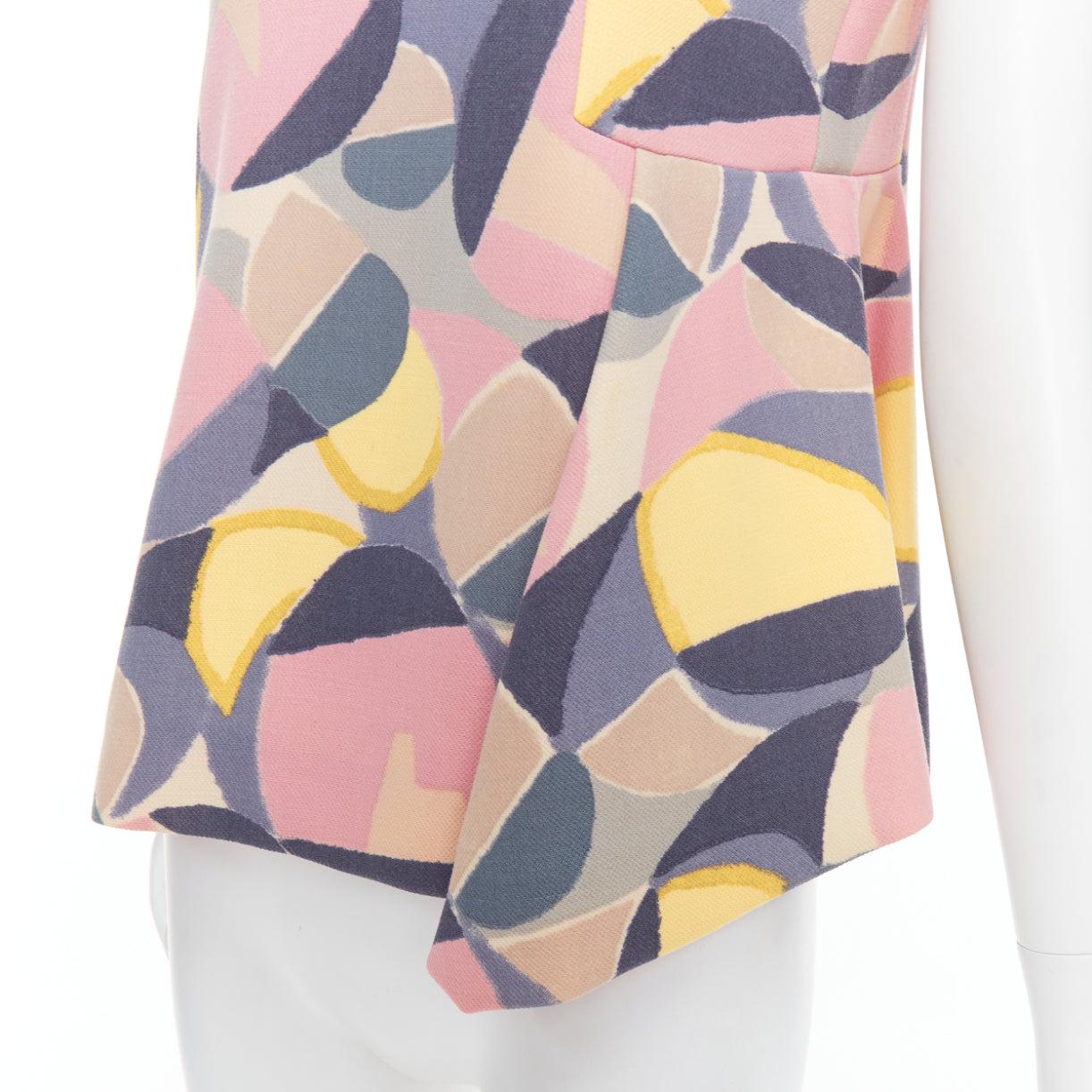 MARNI pastel multicolor abstract print asymmetric peplum top IT38 XS
Reference: WECN/A00022
Brand: Marni
Material: Wool
Color: Multicolour
Pattern: Abstract
Closure: Zip
Extra Details: Back asymmetric zip.
Made in: Italy

CONDITION:
Condition: Fair,