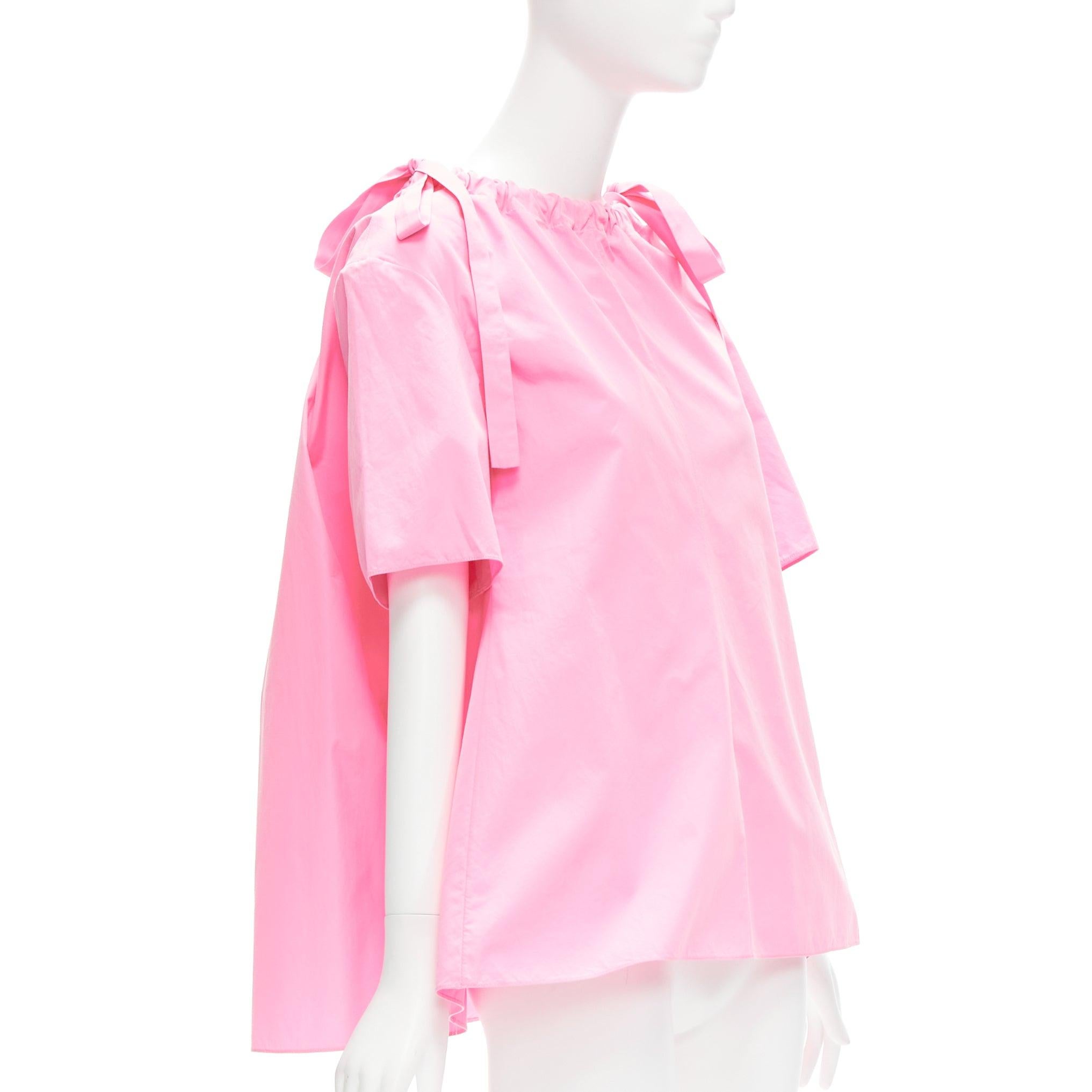 MARNI pink 100% cotton side drawstring collar trapeze top IT36 XXS
Reference: CELG/A00327
Brand: Marni
Material: Cotton
Color: Pink
Pattern: Solid
Closure: Drawstring
Extra Details: Drawstring collar design.
Made in: Italy

CONDITION:
Condition: