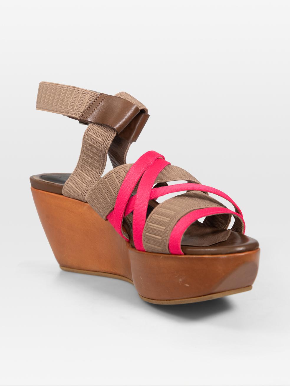 CONDITION is Very good. Minimal wear to to the wedges is evident. Abrasion on both sides of both wedges and on the leather detailing on the ankle strap of both shoes on this used Marni designer resale item. This pair of shoes comes in the original