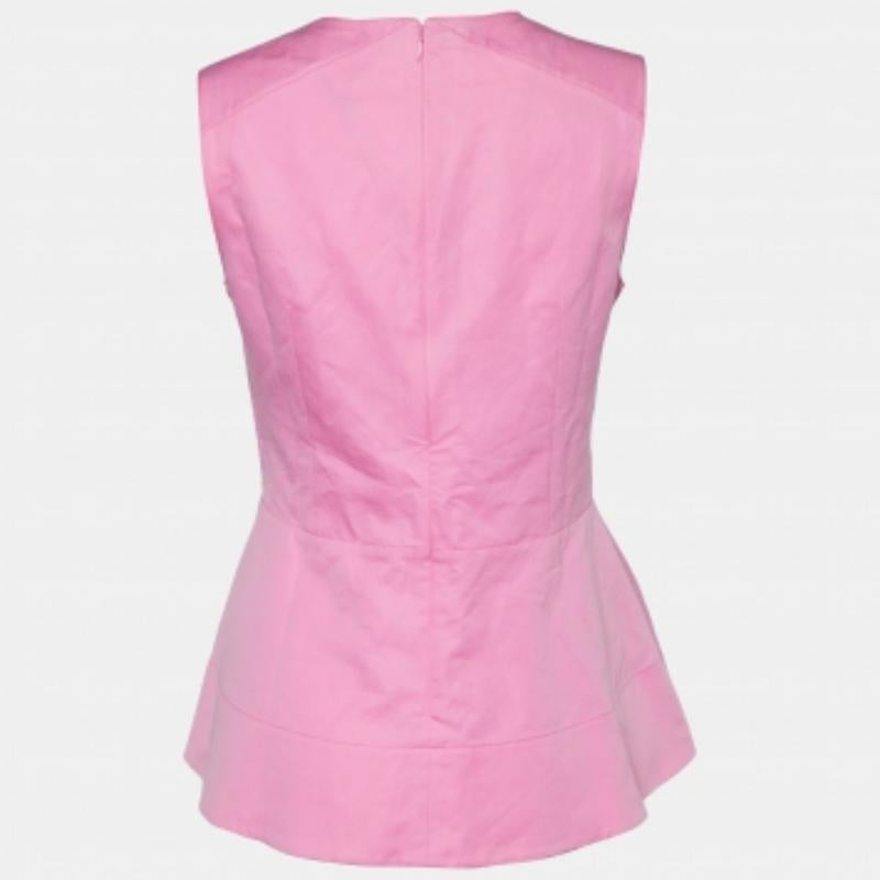 Dieses Designertop bietet Stil und Komfort. Die Kreation wurde aus den besten Stoffen geschneidert und mit vielen Details versehen. Kombinieren Sie es mit einer Jeans und flachen Schuhen.