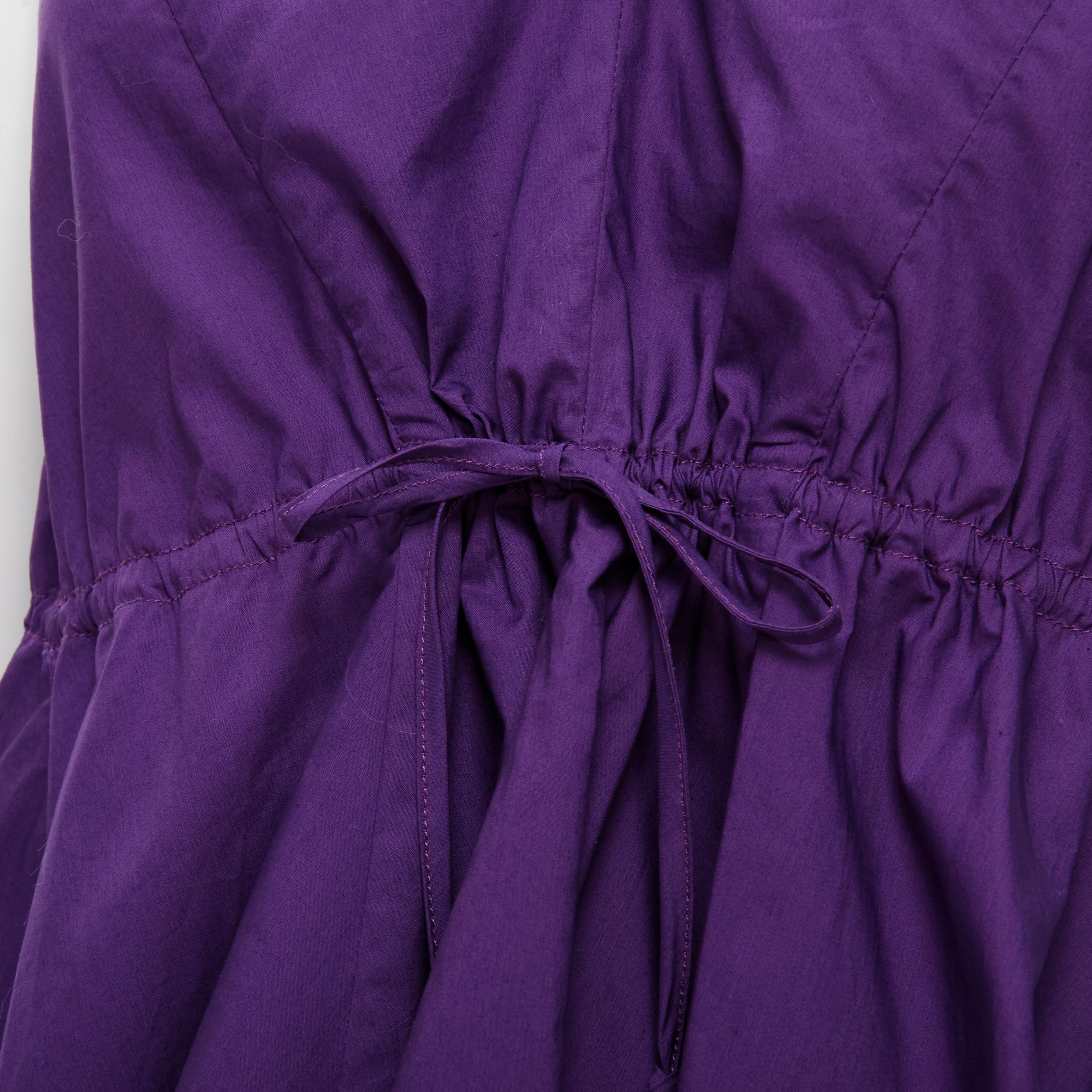 MARNI purple cotton V-neck drawstring peplum high low top IT40 S 
Reference: CELG/A00130 
Brand: Marni 
Material: Cotton 
Color: Purple 
Pattern: Solid 
Closure: Drawstring 
Made in: Italy 

CONDITION: 
Condition: Excellent, this item was pre-owned