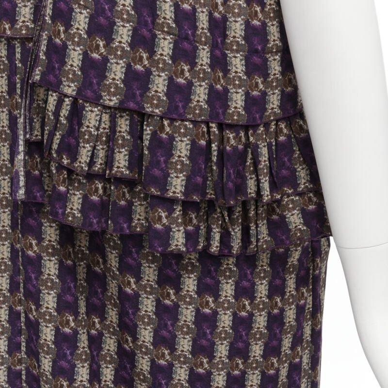 MARNI purple jewel print tier ruffle waist sheath dress IT38 XS
Reference: CELG/A00110
Brand: Marni
Material: Silk
Color: Purple
Pattern: Geometric
Closure: Zip
Extra Details: Dual side pockets under ruffles.
Made in: Italy

CONDITION:
Condition: