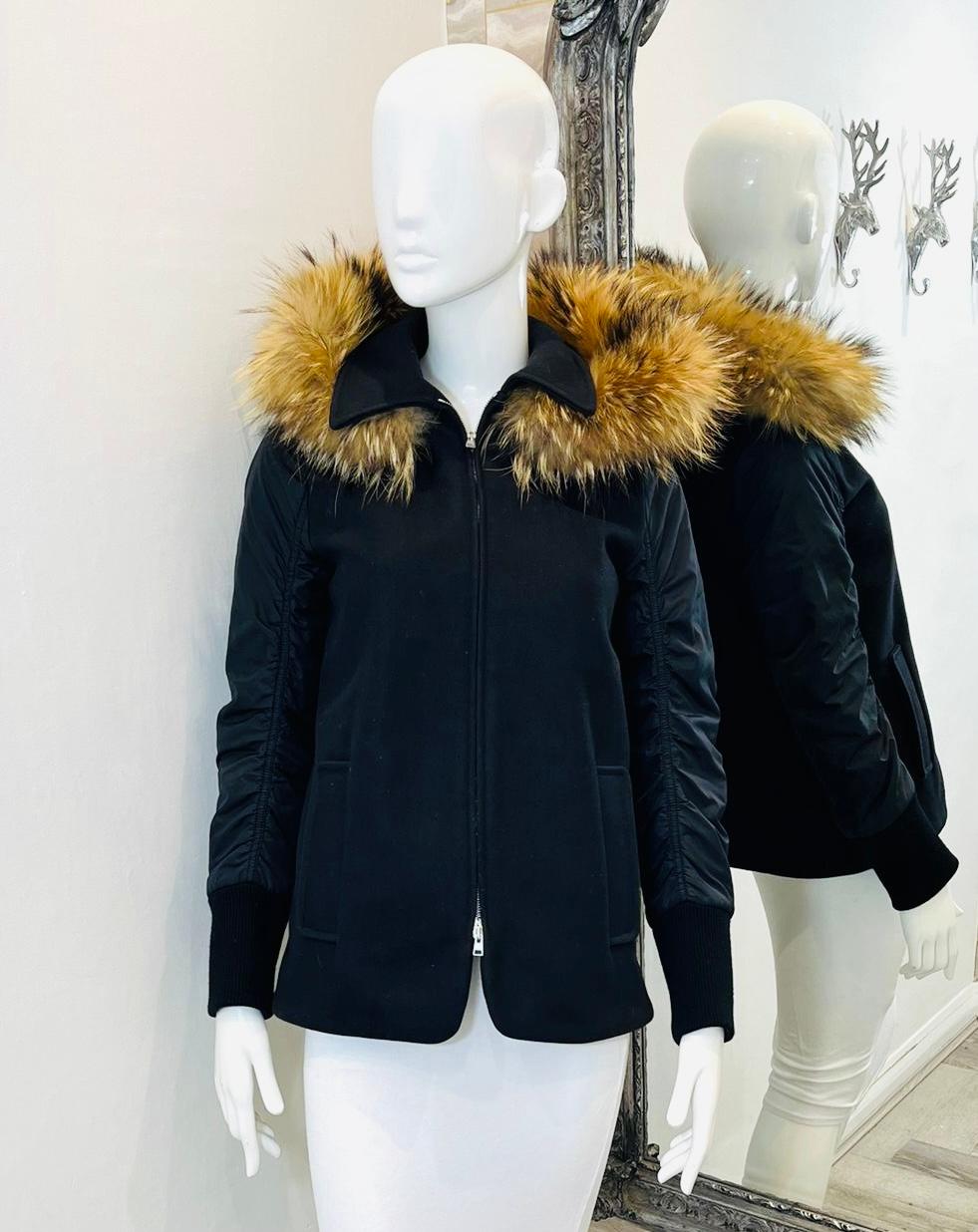 Marni Raccoon Trimmed Wool & Shearling Coat/Jacket

Black coat designed with raccoon trimmed centre zipped hood.

Detailed with ruched detailed, long sleeves and collared neckline.

Featuring ribbed cuffs, side pockets and zip fastening.

Size –