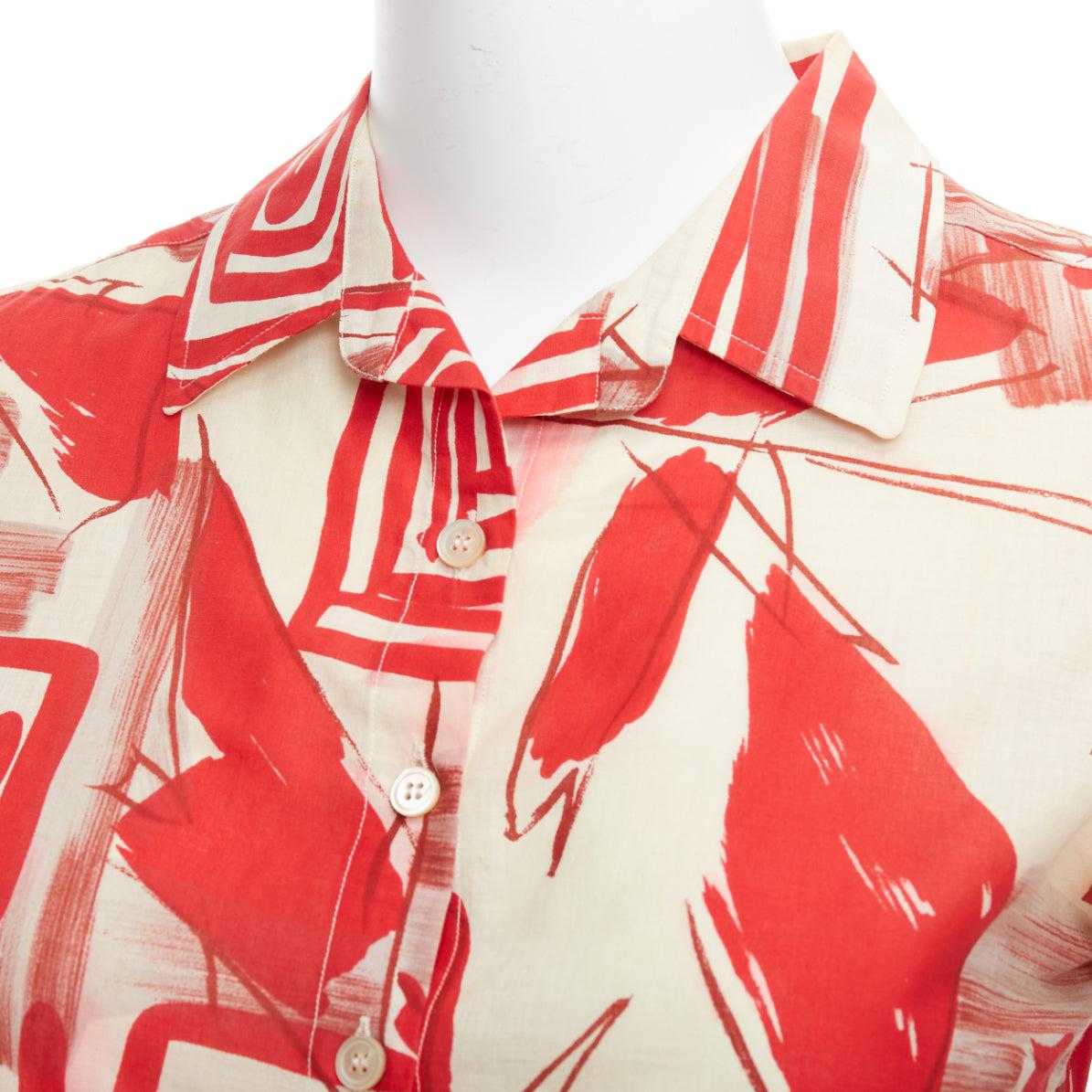 MARNI red beige 100% cotton abstract floral print crop shirt IT38 XS
Reference: LNKO/A02409
Brand: Marni
Material: Cotton
Color: Red, Beige
Pattern: Abstract
Closure: Button
Made in: Italy

CONDITION:
Condition: Good, this item was pre-owned and is