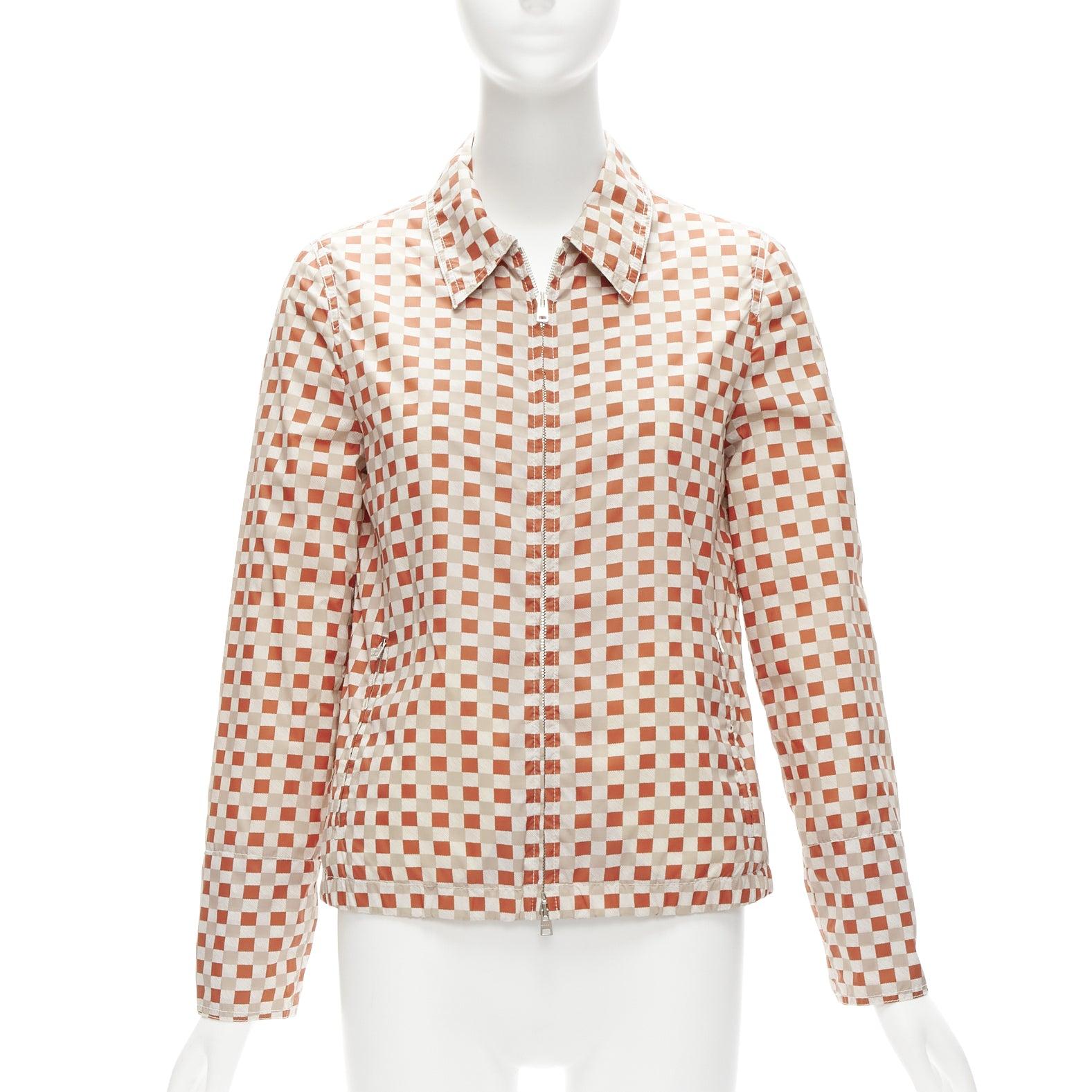 MARNI red beige checkerboard collared zip shell jacket IT38 XS
Reference: CELG/A00247
Brand: Marni
Material: Polyamide
Color: Red, Khaki
Pattern: Checkered
Closure: Zip
Lining: White Fabric
Extra Details: 2 pockets at front.
Made in: