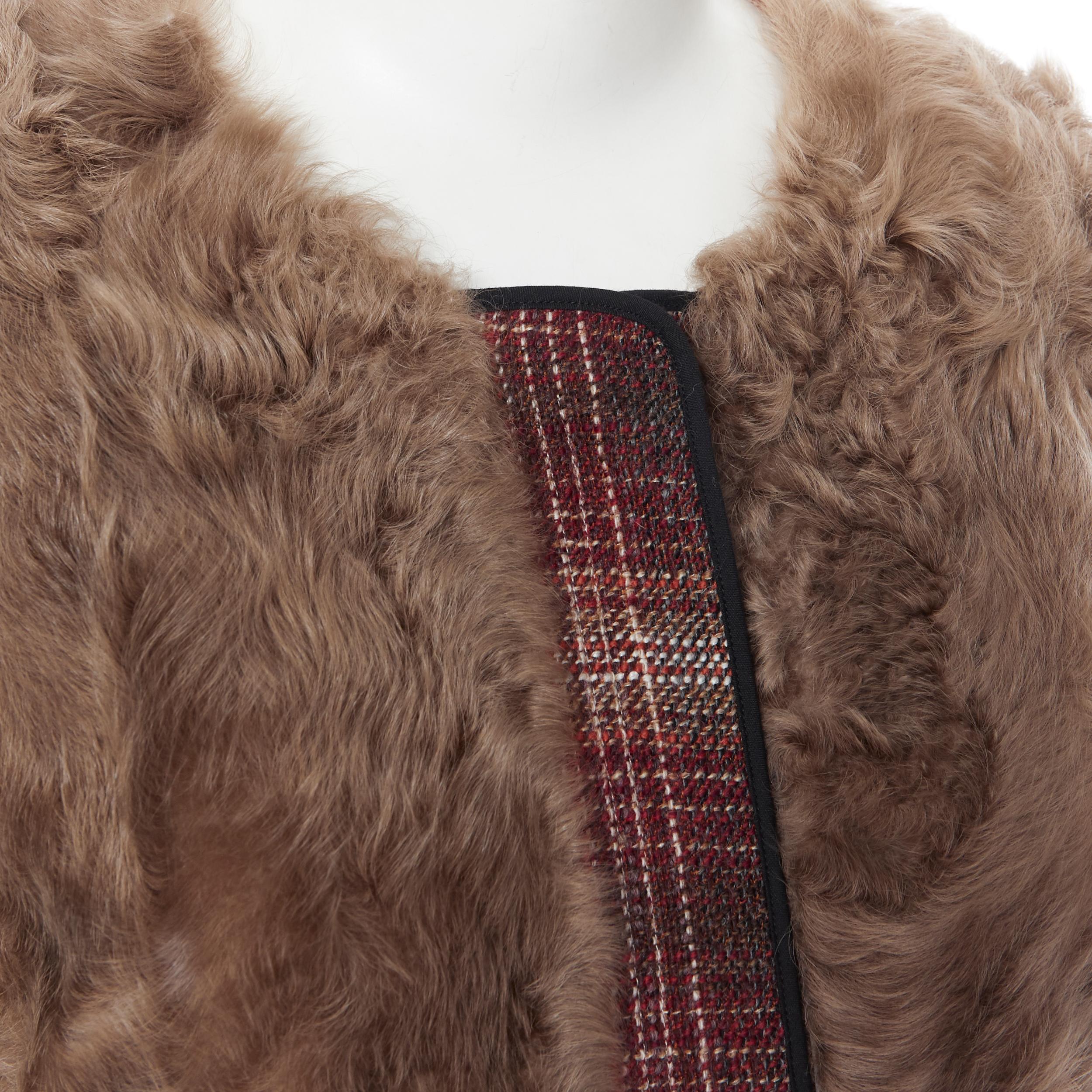 MARNI red checked wool tweed shearling fur panel colorblocked sleeve coat IT40
Brand: Marni
Model Name / Style: Tweed coat
Material: Wool
Color: Red, brown
Pattern: Check
Closure: Zip
Extra Detail: Genuine shearling fur front panel. Cut out at