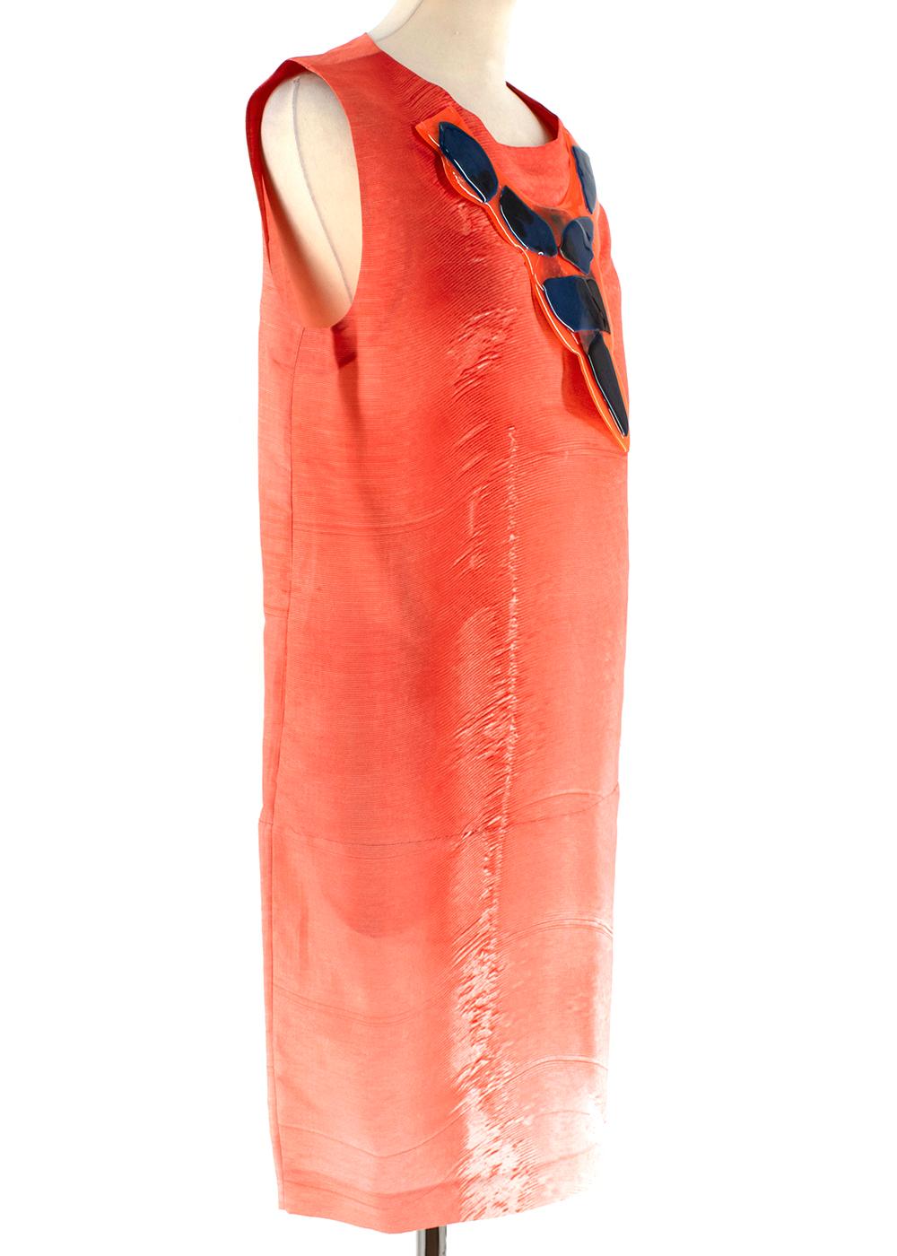 Marni Red Shift Dress With Front Textured Motif 

- Shift style 
- Plastic motif attached to the front, navy blue shapes on a red background
- Round neck 
- Sleeveless
- Back zip fastening 
- Side slip pockets 

THERE IS NO CARE LABEL THEREFORE WE
