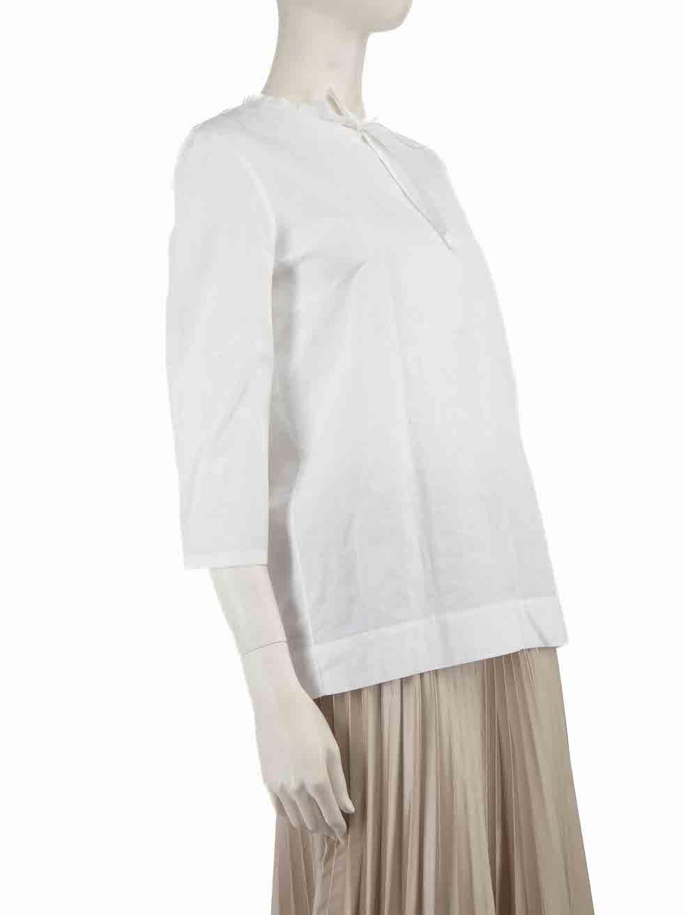 CONDITION is Very good. Minimal wear to shirt is evident. Minimal wear to left sleeve cuff and shoulder with discoloured marks on this used Marni designer resale item.
 
 Details
 S/S13
 White
 Cotton
 Blouse
 Long sleeves
 Neck tie detail
 Round