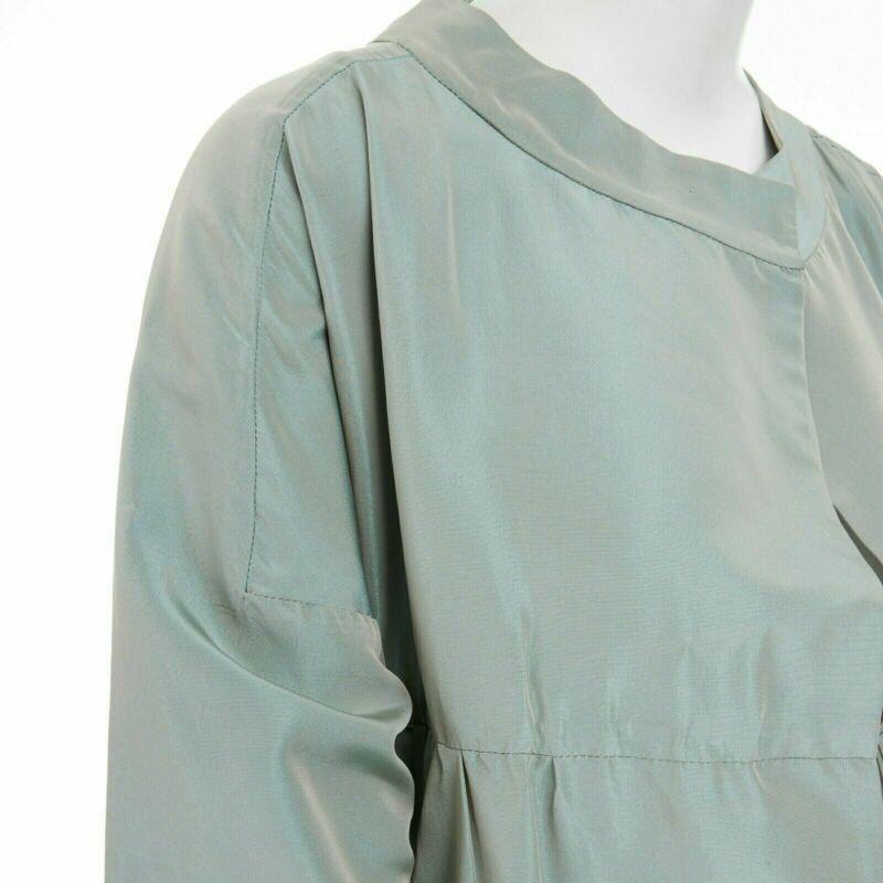 MARNI silk acetate green collarless 3/4 sleeve light weight coat IT40 S
Reference: TGAS/A02952
Brand: Marni
Material: Silk
Color: Green
Pattern: Solid
Closure: Button
Extra Details: Silk, acetate. Light iridescent sheen green. Collarless. Snap