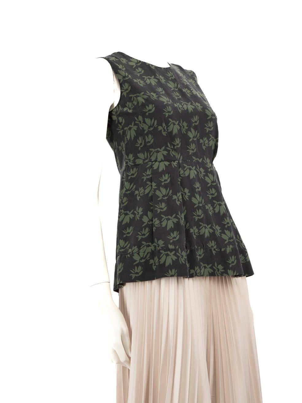 CONDITION is Good. General wear to the top is evident, there is overall discolouration on this used Marni designer resale item.
 Details
 Multicolour: Black and Green
 Silk
 Tank top
 Sleeveless
 Floral pattern
 Round neck
 Back zip fastening
 
 
