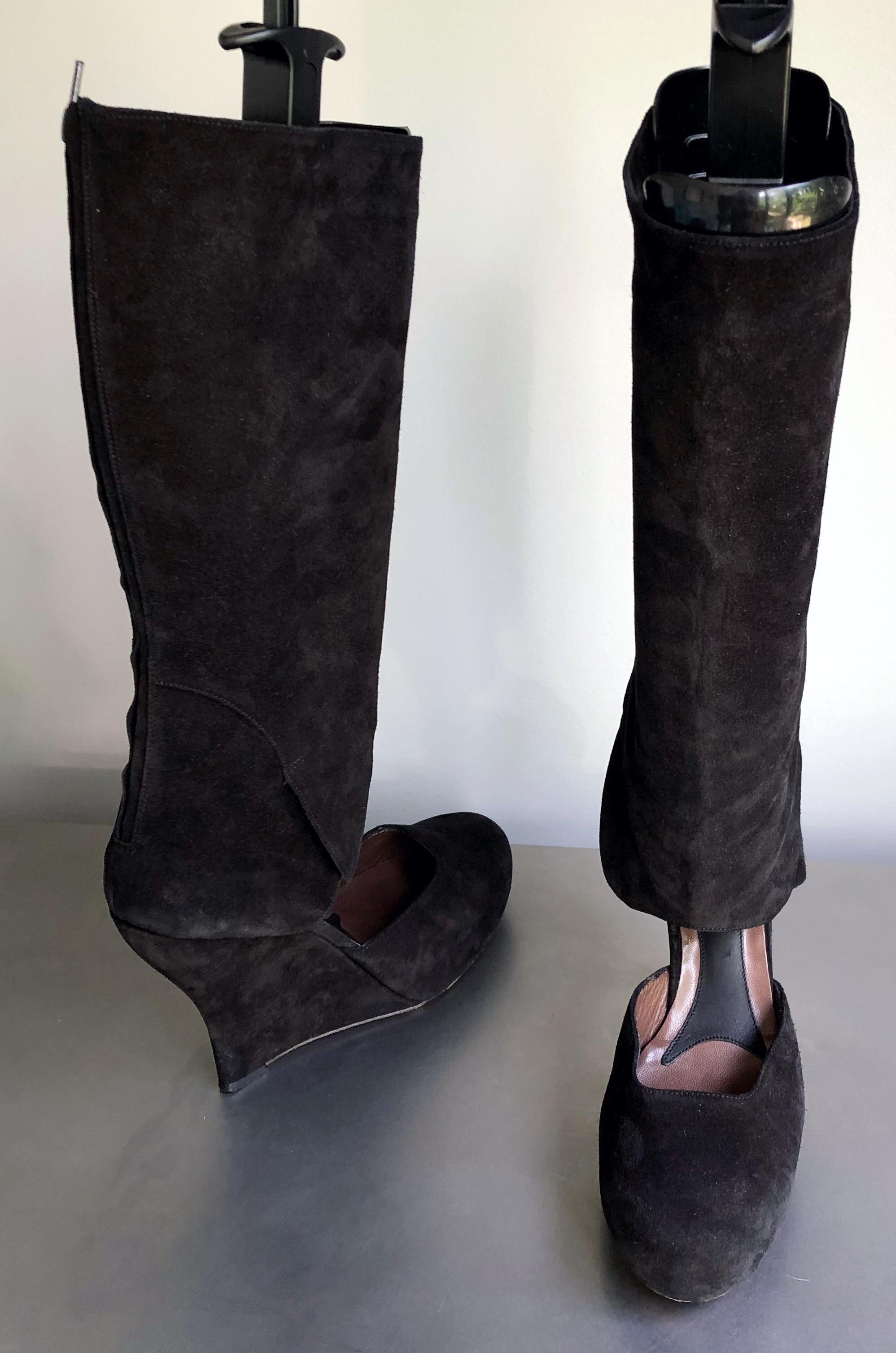 Early 2000s MARNI black suede leather cut-out knee high wedges boots ! The perfect statements boots that retailed for $1,700 when purchased. Can easily be dressed up or down, day or evening. Zipper up the inner calf. 
Worn once for a photo shoot. In