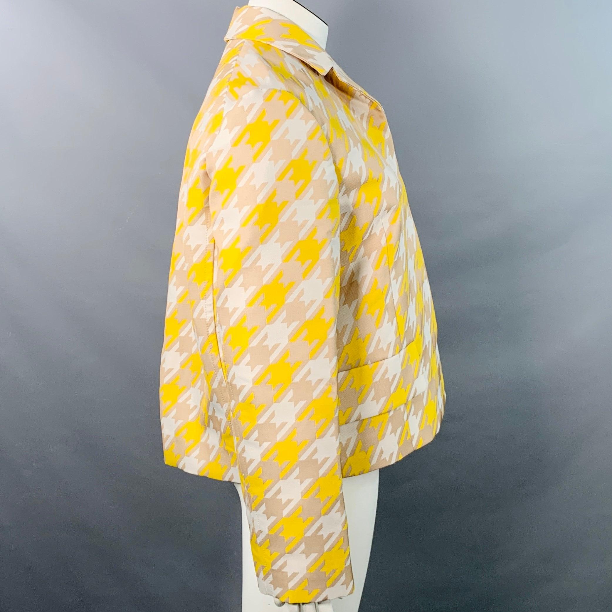 Giacca Marni
in poliestere giallo e beige con ampio motivo pied-de-poule, due tasche e chiusura con bottoni nascosti. Made in Italy.Ottime condizioni di usato. Marchio minore. 

Contrassegnato:   IT 46 

Misure: 
 
Spalla: 16,75 pollici Busto: 47