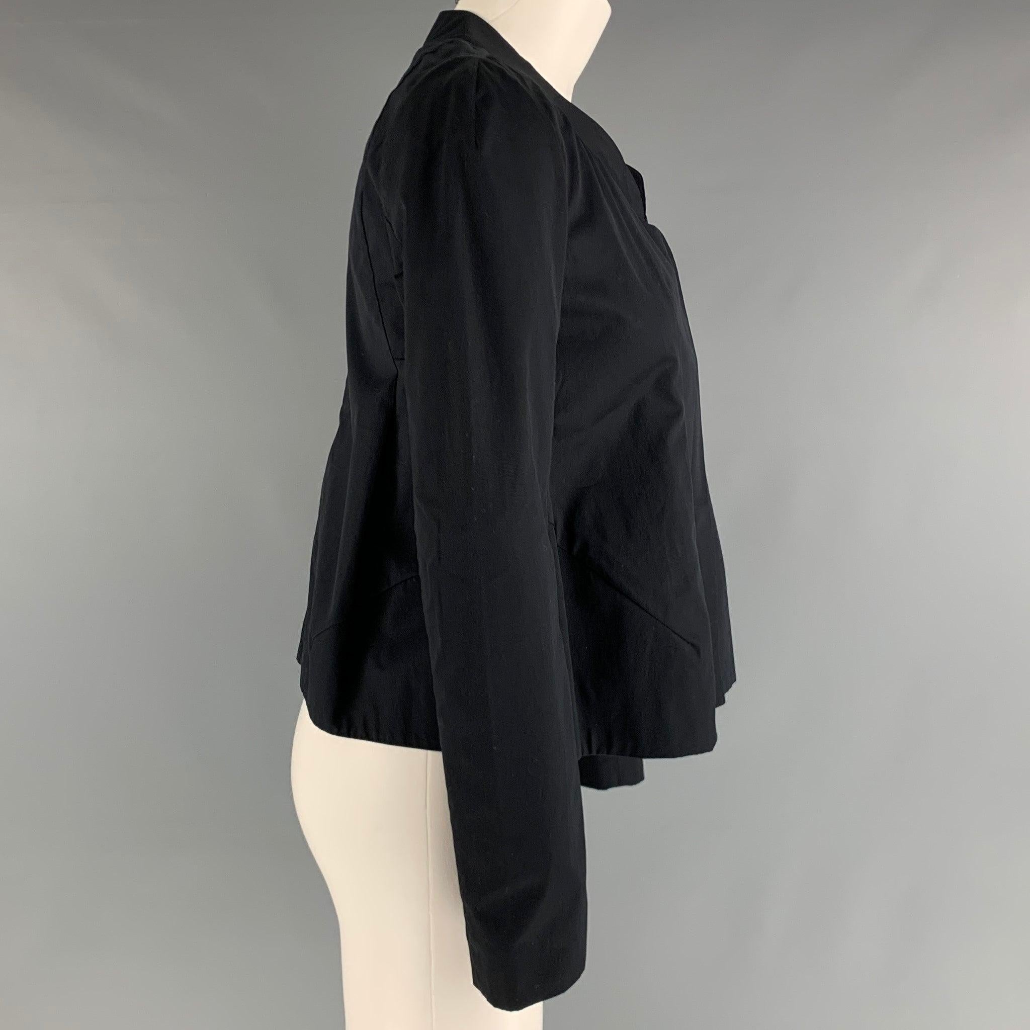 MARNI jacket comes in a black cotton woven material featuring a hidden snap button closure, and a collarless. Made in Italy. Excellent Pre-Owned Condition. 

Marked:   38 

Measurements: 
 
Shoulder: 17.5 inches Bust: 36 inches Sleeve: 17.5 inches