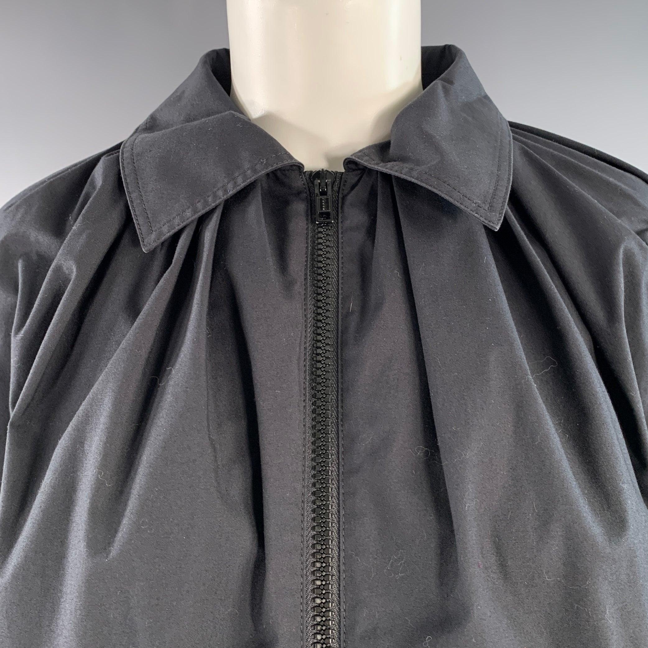 MARNI jacket
in a black polyester blend fabric featuring ruched shoulders, oversized fit, and zip up closure. Made in Italy.Excellent Pre-Owned Condition. 

Marked:   IT 38 

Measurements: 
 
Shoulder: 27 inches Bust: 48 inches Sleeve: 17.5 inches