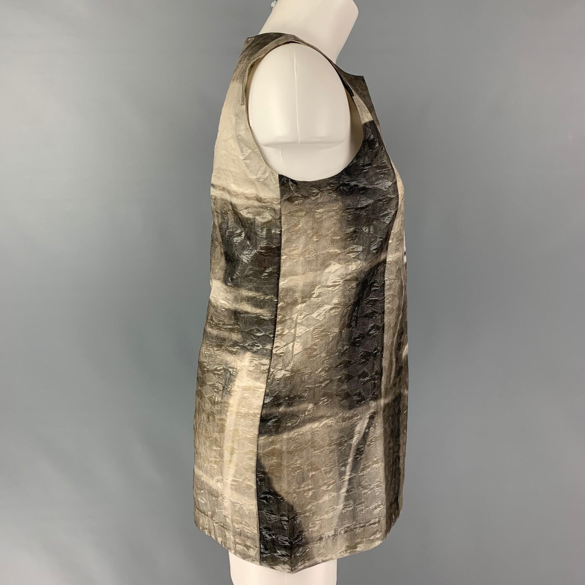 MARNI sleeveless dress top comes in a silk and linen fibers abstract print fabric featuring 3/4 center back zip up. Made in Italy.Excellent Pre-Owned Condition. 

Marked:  38 

Measurements: 
 
Shoulder: 13 inches Bust: 35 inches Length: 28 inches 
