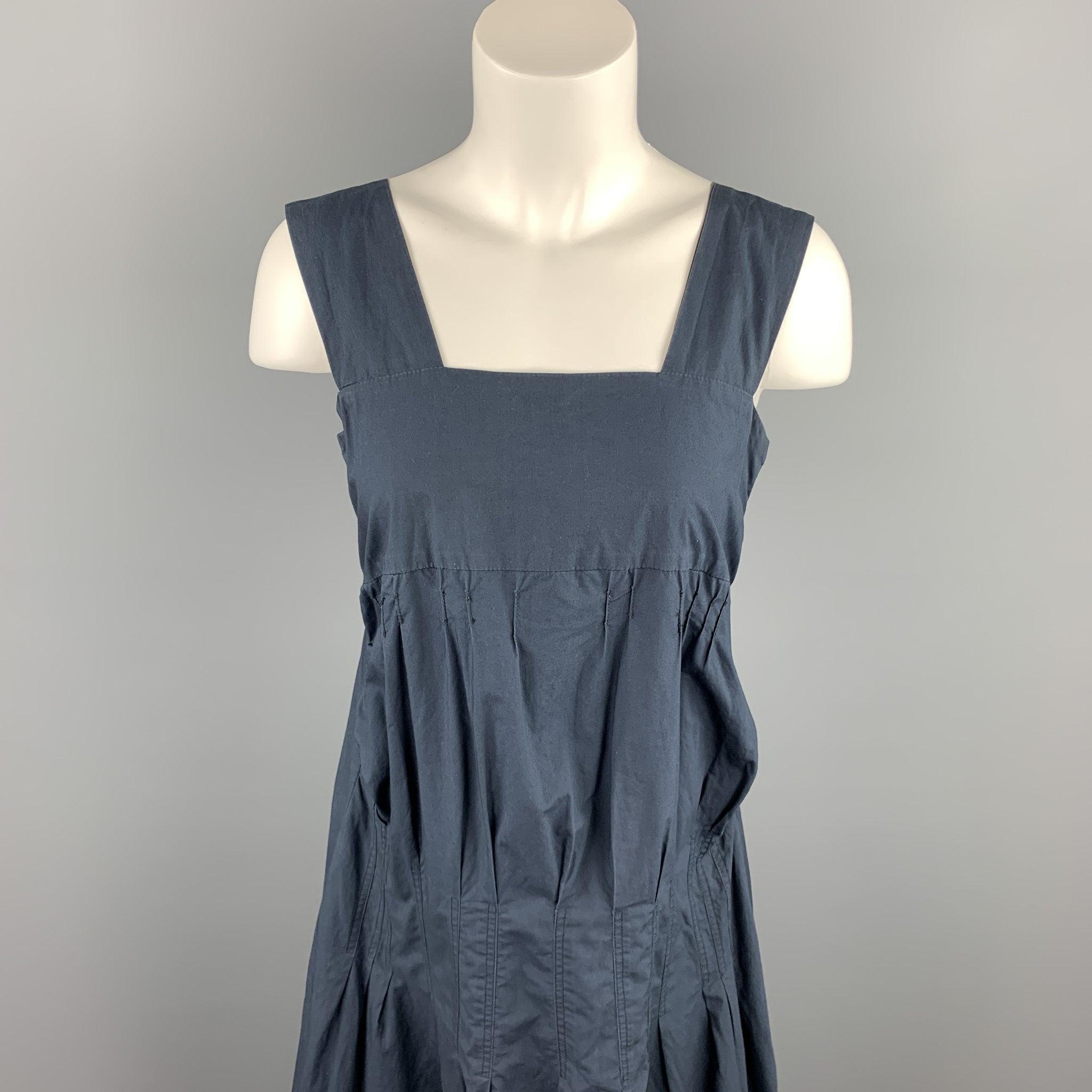 MARNI sleeveless dress comes in a navy poplin cotton featuring pleated designs and a side zipper closure. Made in Italy.Very Good
Pre-Owned Condition. 

Marked:   IT 40 

Measurements: 
  Bust: 30 inches 
Waist: 32 im.
Hip: 40 inches 
Length: 32.5