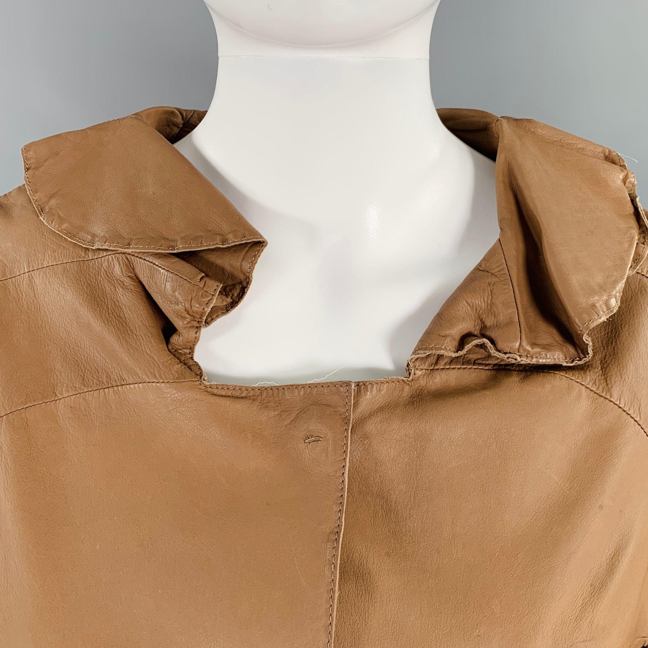 MARNI jacket blazer
in a brown calfskin leather featuring an unlined style, three pockets, and snap closure. Made in Italy.Very Good Pre-Owned Condition. Multiple minor marks on front. 

Marked:   IT 40 

Measurements: 
 
Shoulder: 16 inches Bust: