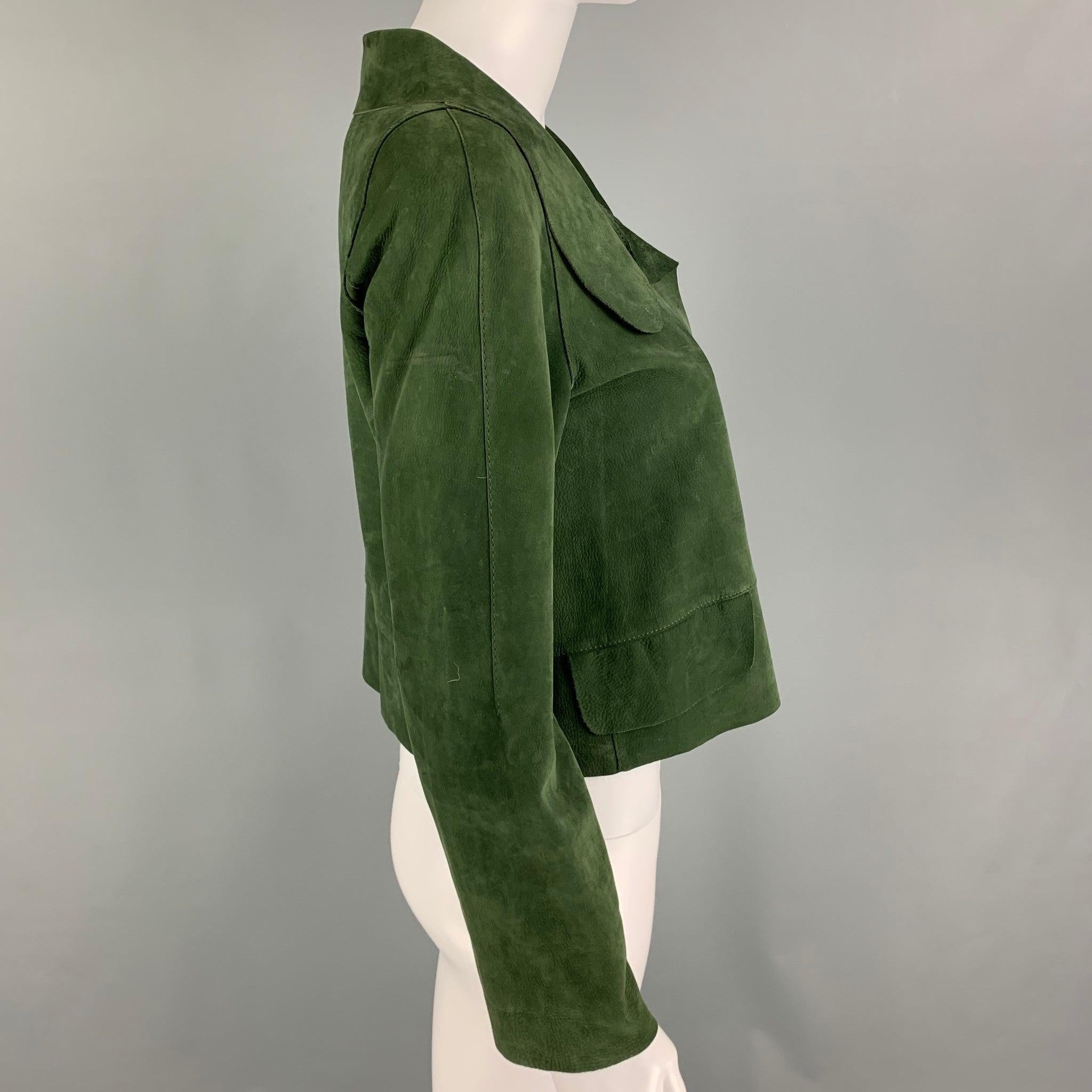MARNI jacket comes in a green suede featuring a spread collar, flap pockets, and a single snap button closure.
Very Good
Pre-Owned Condition. Moderate discoloration throughout. Logo & Fabric tag removed. As-is.  

Marked:   40 

Measurements: 
