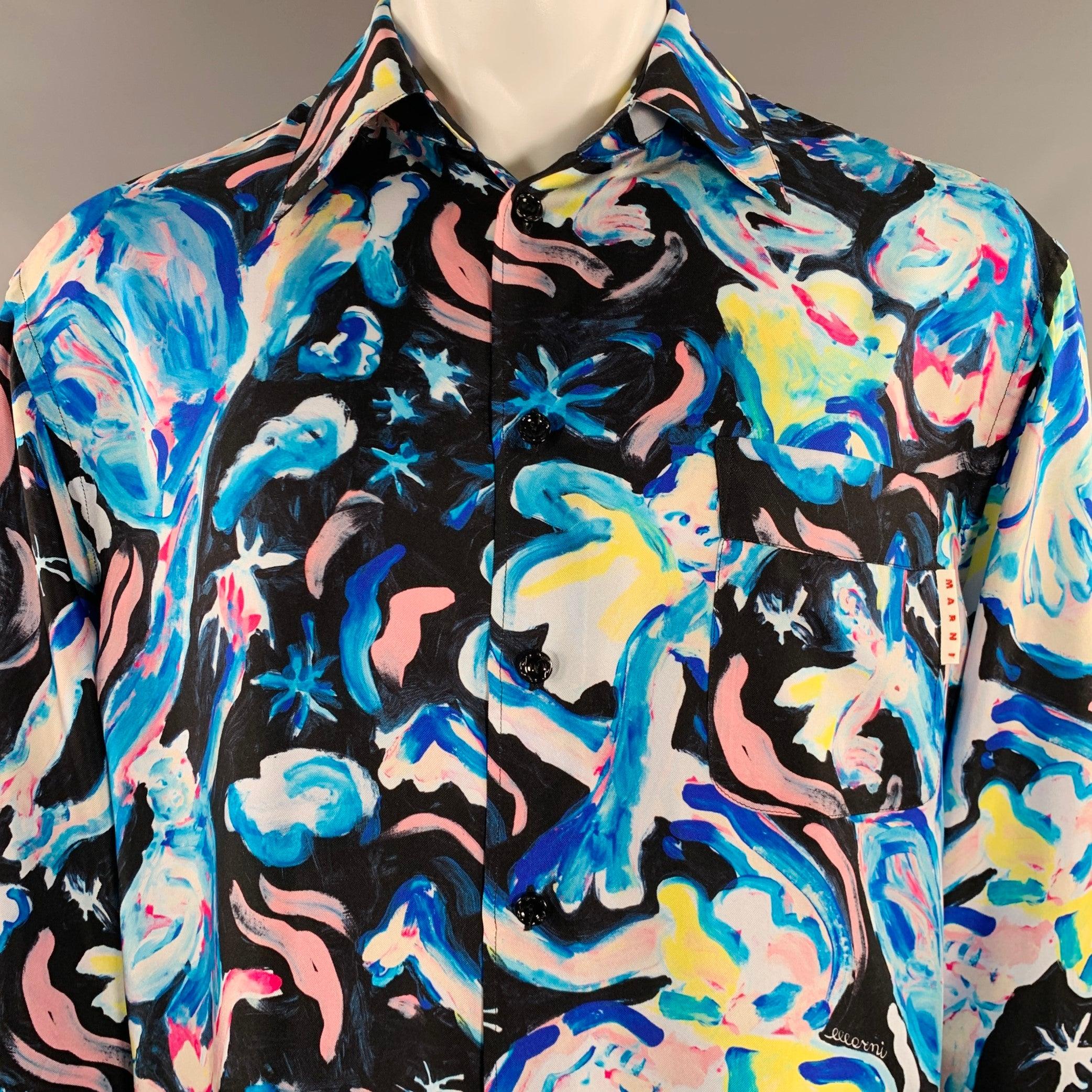 MARNI Langarmhemd
aus blauer und schwarzer Seide mit lebhaftem grafischem Druck, einer Tasche und Knopfverschluss. Kunst von Flaminia Veronesi. Made in Italy Ausgezeichneter Pre-Owned Zustand. 

Markiert:   IT 50 

Abmessungen: 
 
Schulter: 20,5
