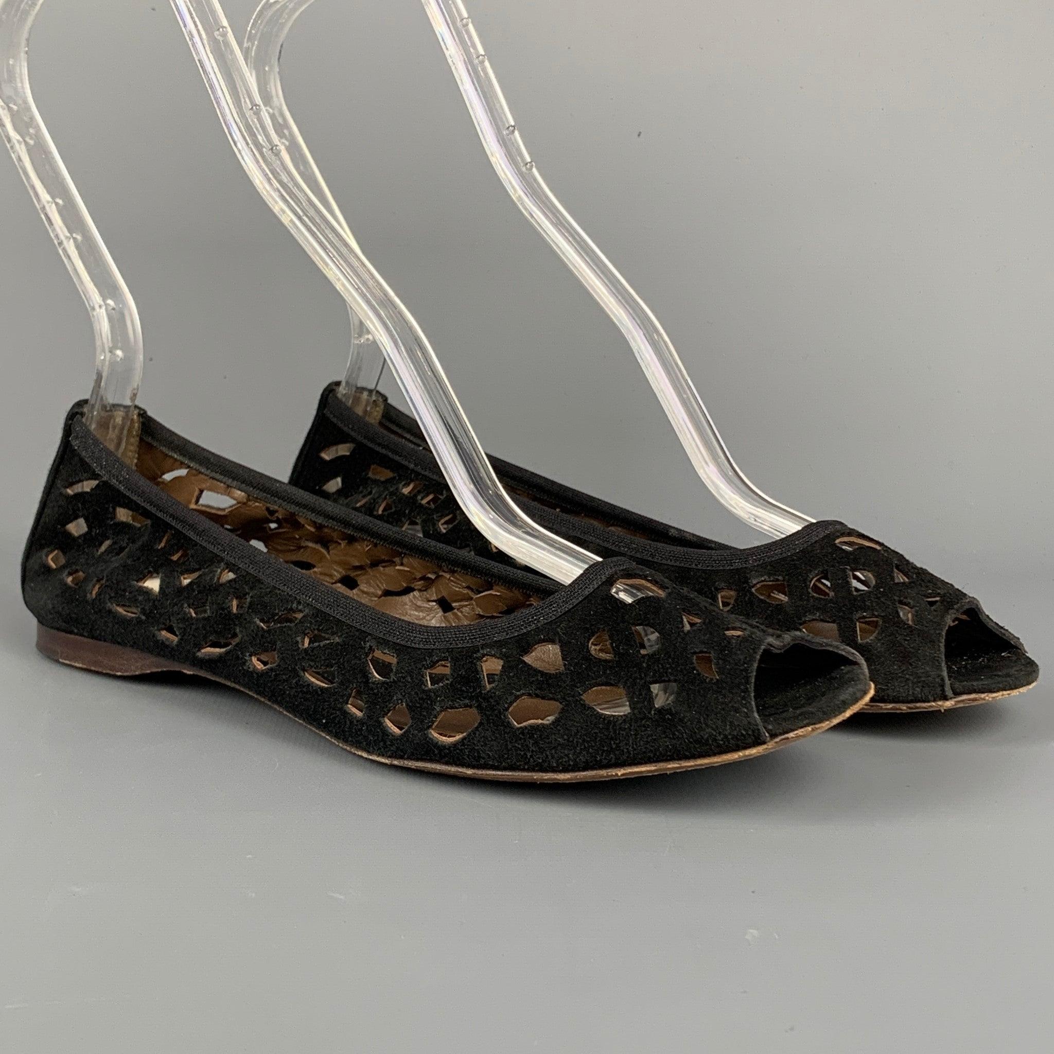 MARNI flats comes in a black suede featuring a cut out design, open toe, and a wooden sole. Made in Italy.Good
Pre-Owned Condition. Light fading at exterior.  

Marked:   EU 36 

Measurements: 
  Outsole: 3 inches  x 9 inches 
  
  
 
Reference: