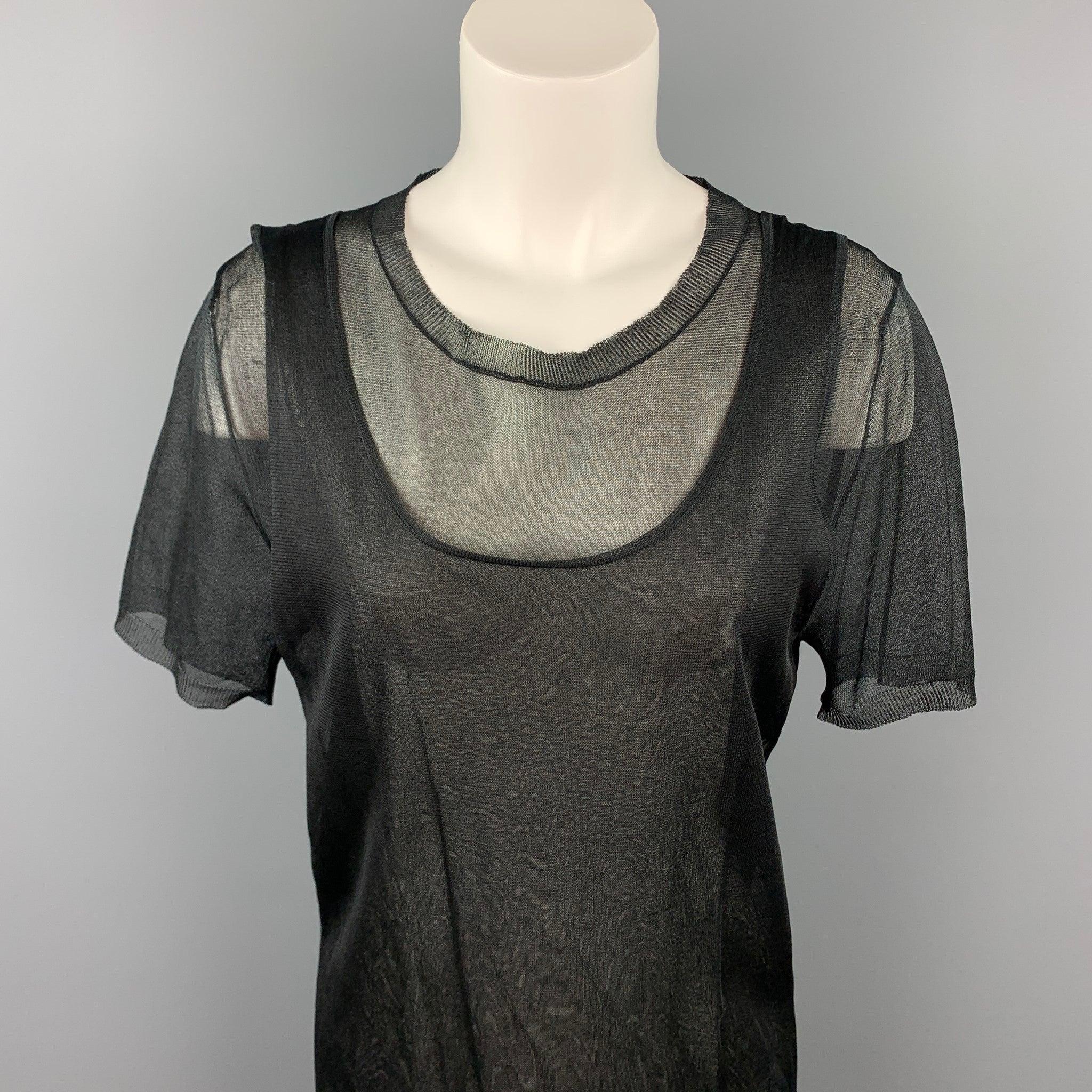 MARNI casual top comes in a black see through silk featuring a layered tank style and a crew-neck. Made in Italy.Excellent Pre-Owned Condition w/ Tags
 

Marked:   IT 42 

Measurements: 
 
Shoulder: 16.5 inches  Bust: 36 inches  Sleeve: 10.5 inches 