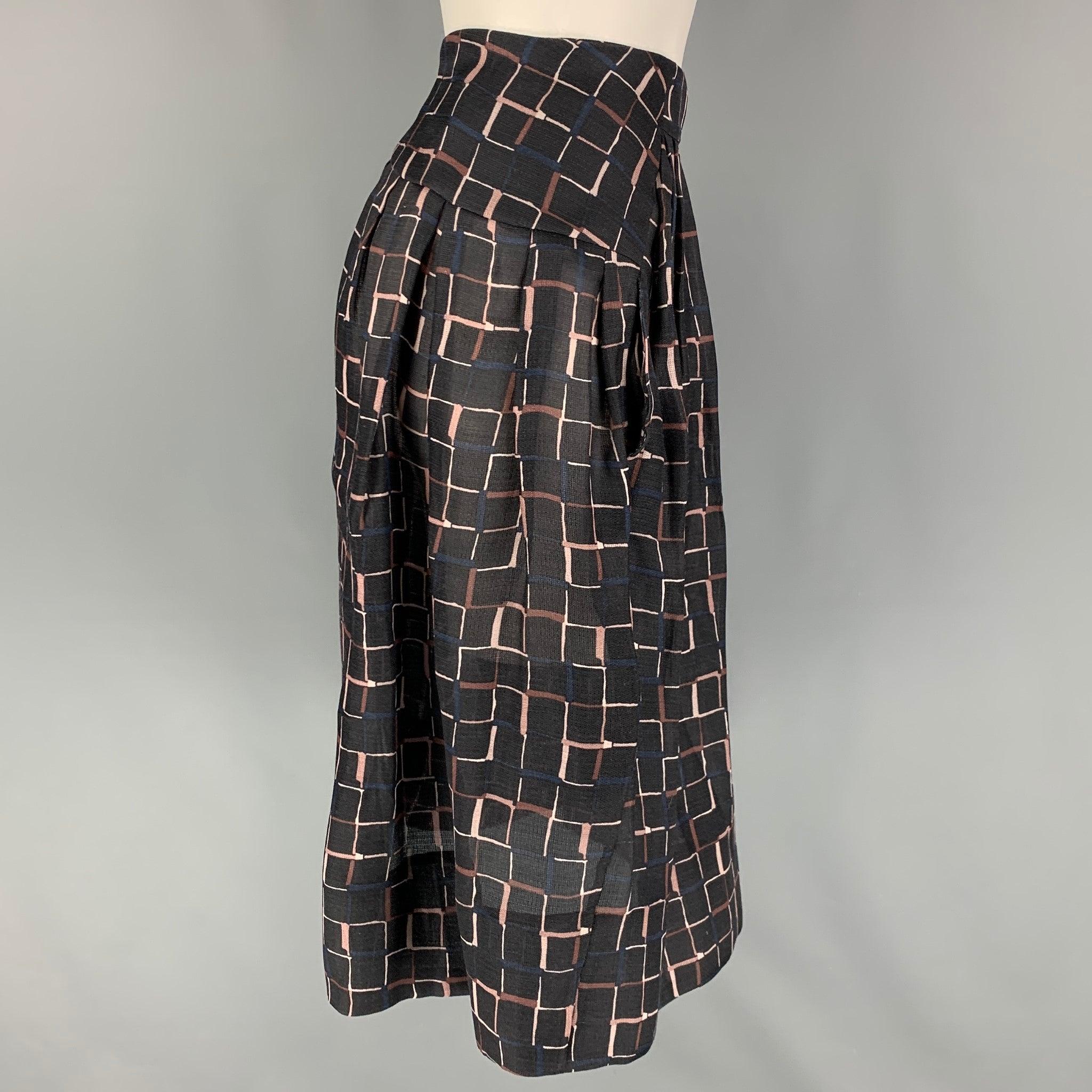 MARNI skirt comes in a black & taupe print wool 
featuring a pleated style and a back zipper closure. Made in Italy.
Very Good
Pre-Owned Condition. 

Marked:   42 

Measurements: 
  Waist: 28 inches  Hip: 42 inches  Length: 25.5 inches 
  
  
