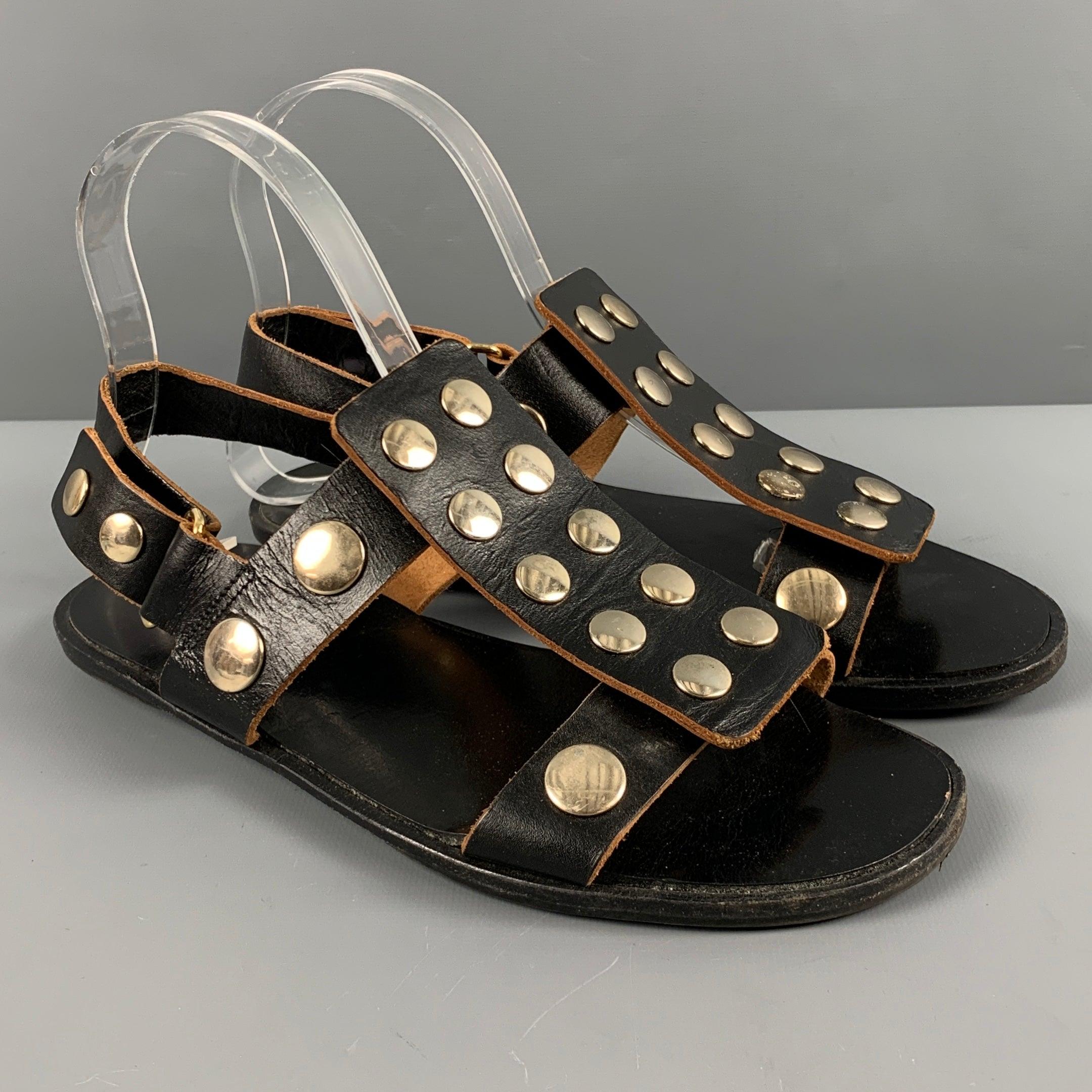 MARNI sandals
in a black and tan leather featuring an ankle strap style, and studded look. Made in Italy.Very Good Pre-Owned Condition. Moderate signs of wear on studs. 

Marked:   size not marked.Outsole: 9.5 inches  x 3.75 inches 
  
  
