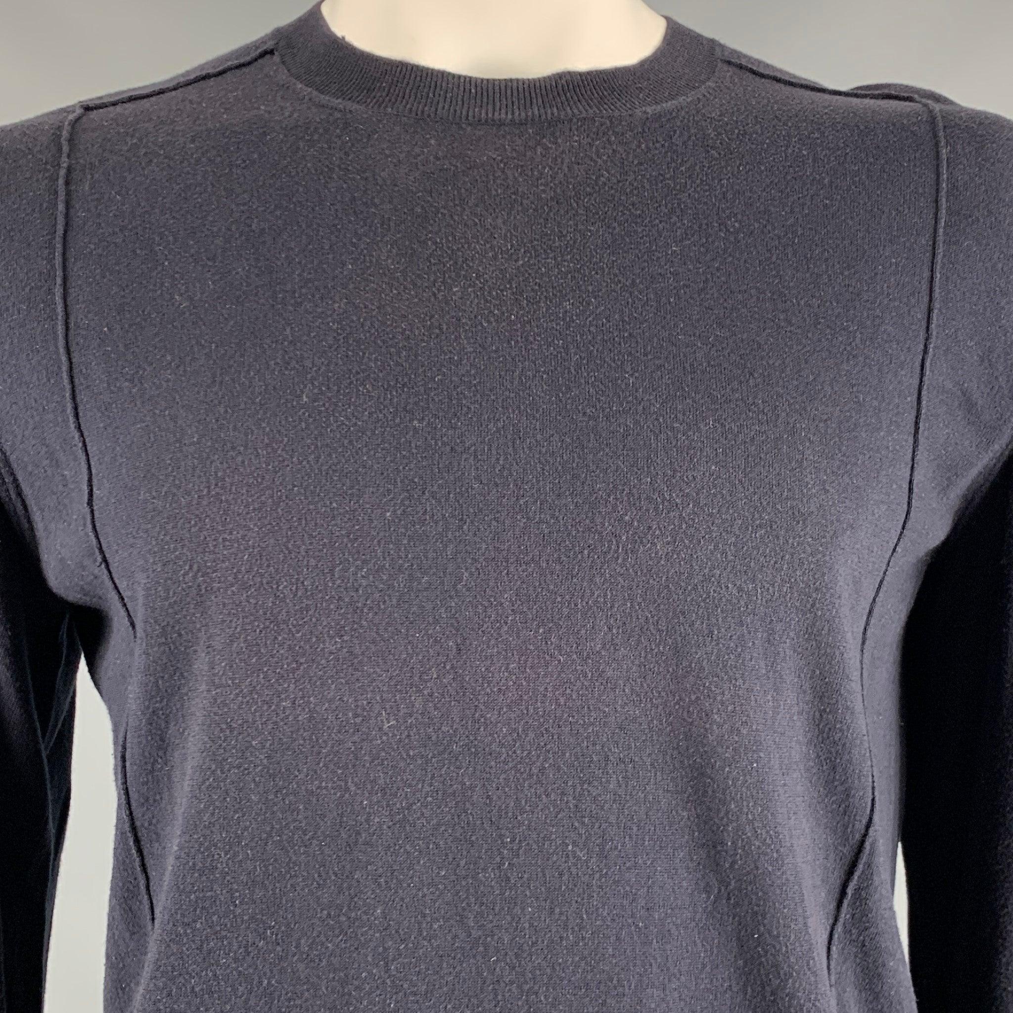 MARNI pullover
in a navy cotton fabric featuring inclined torso stitch, and a crew neck. Made in Italy.Very Good Pre-Owned Condition. Moderate signs of wear. 

Marked:   52 

Measurements: 
 
Shoulder: 16.5 inches Chest: 46 inches Sleeve: 27 inches