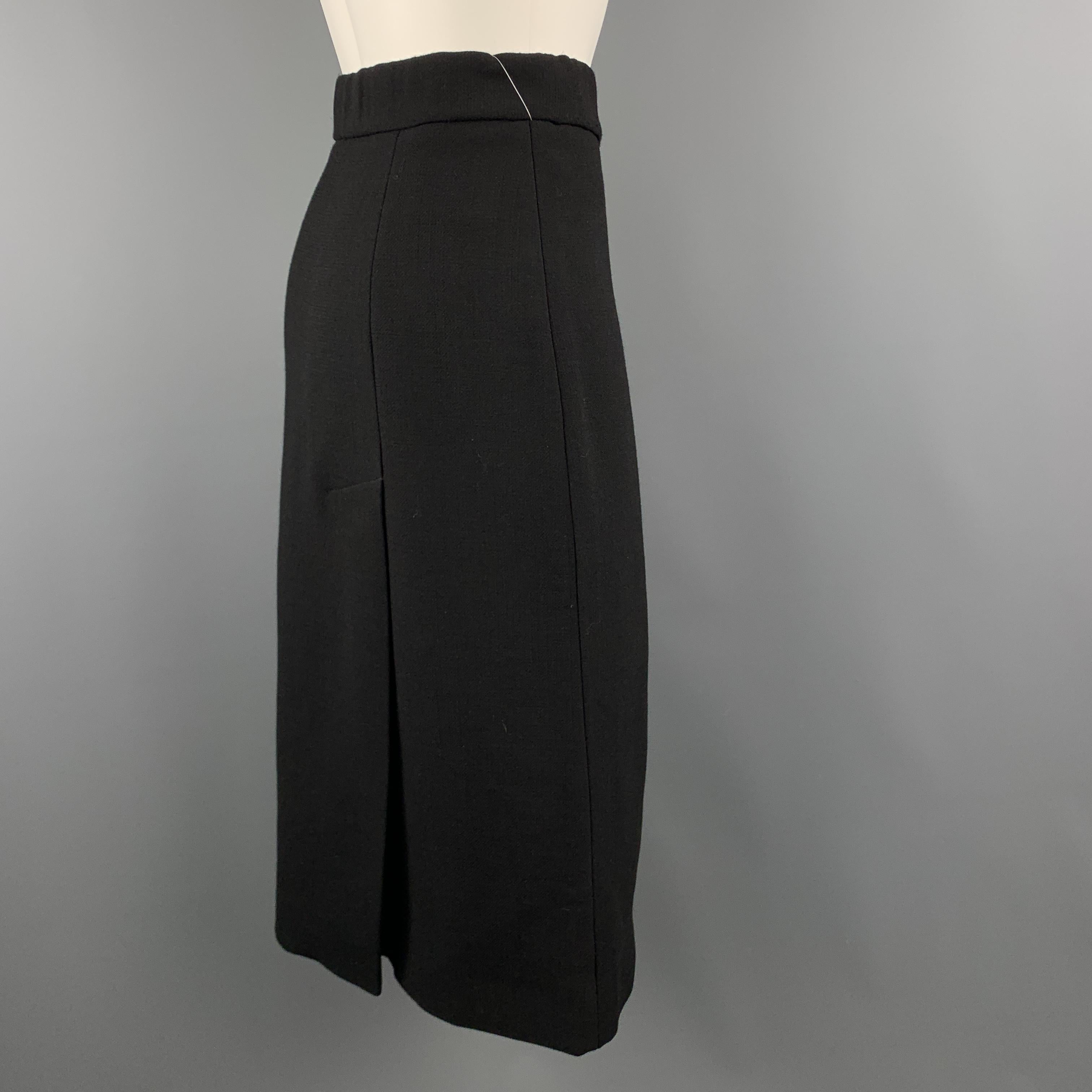 MARNI skirt comes in structured black wool with an A line silhouette and side slits. Made in Italy.

Excellent Pre-Owned Condition.
Marked: IT 40
 
Measurements:

Waist: 27 in.
Hip: 36 in.
Length: 27 in.