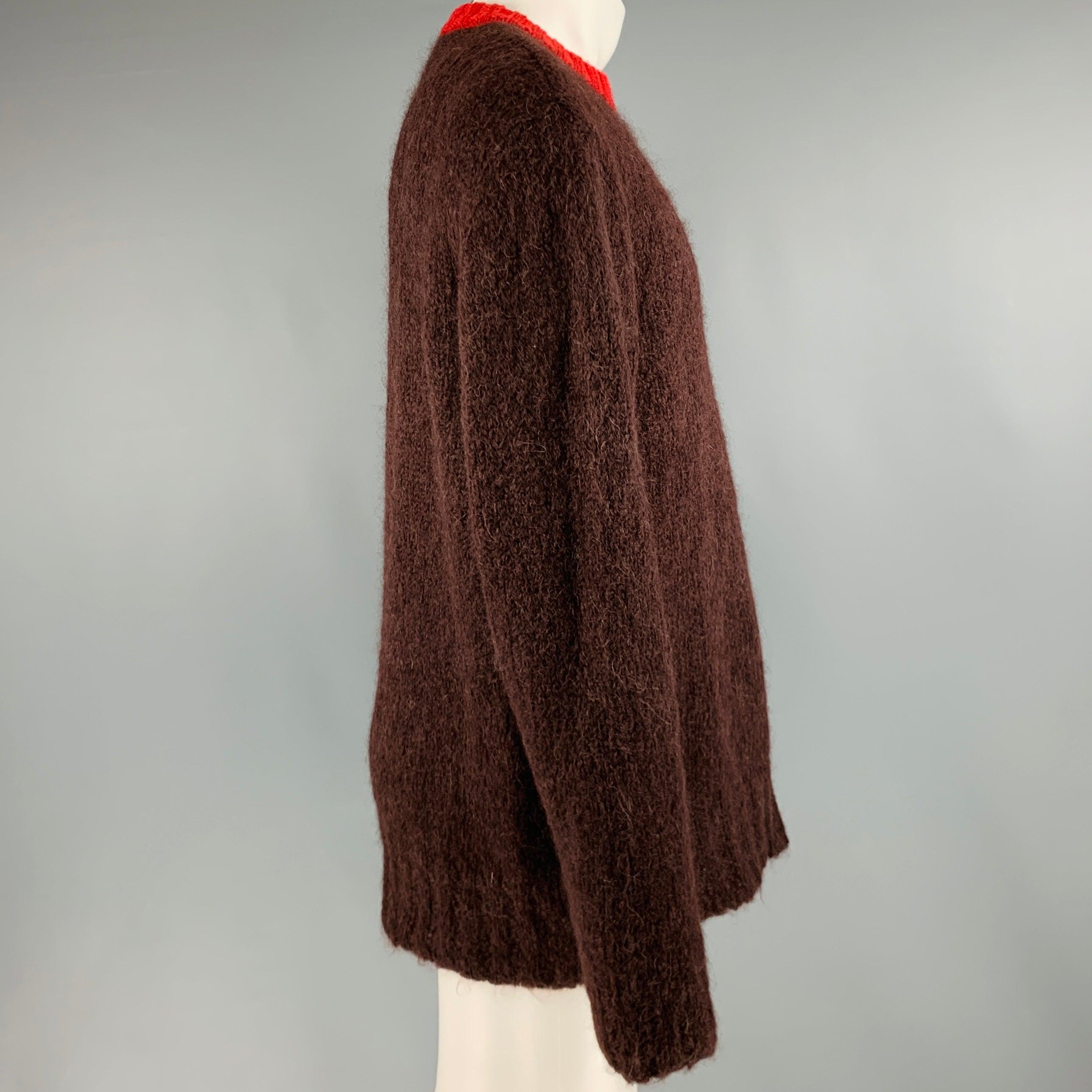MARNI sweater
in a brown mohair blend knit featuring red contrast trim, and crew neck. Made in Italy.Excellent Pre-Owned Condition. 

Marked:   50 

Measurements: 
 
Shoulder: 19 inches Chest: 50 inches Sleeve: 27 inches Length: 29.5 inches 
  
  
