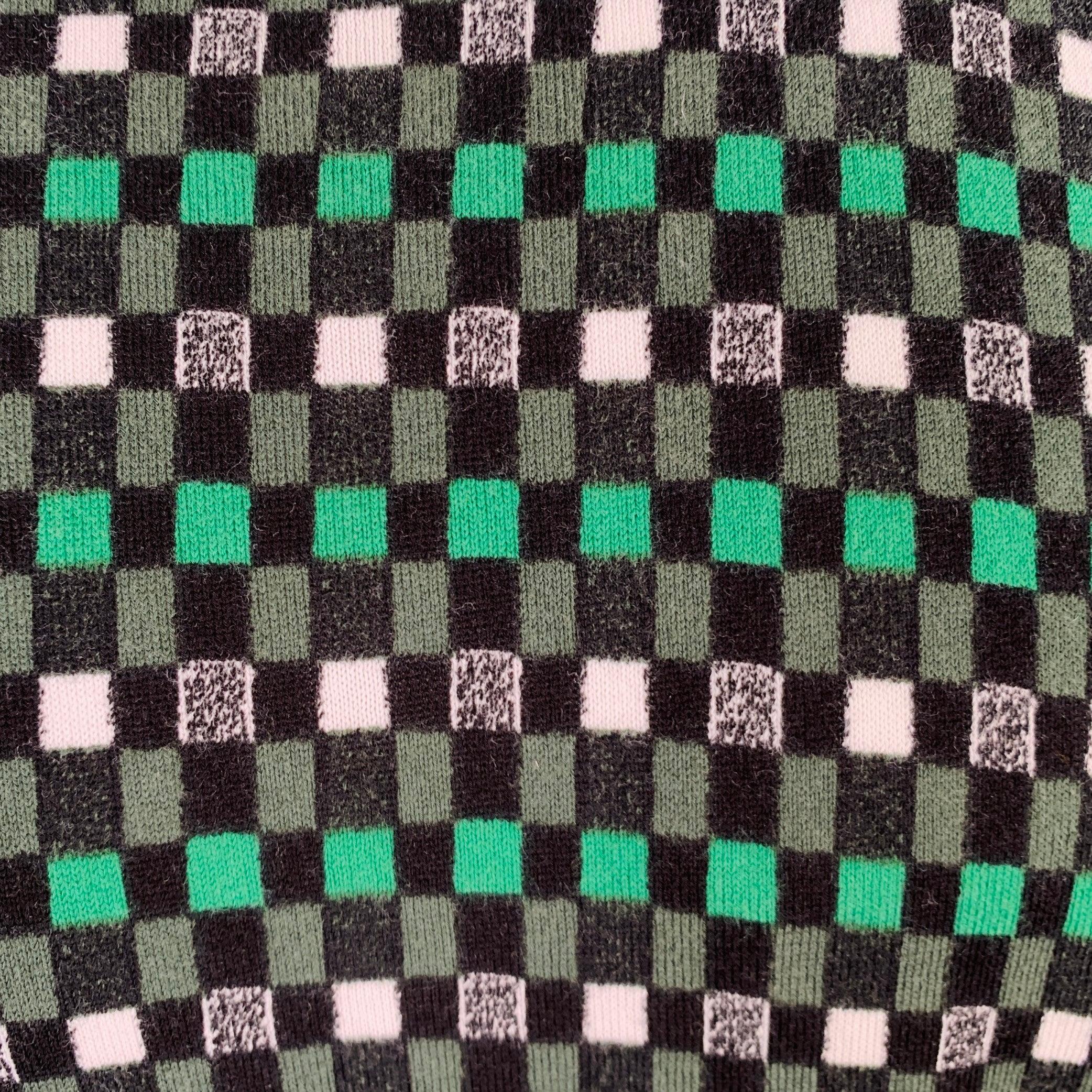 MARNI pullover
in a green and black cotton knit featuring a checkered pattern, short sleeves, and crew neck. Made in Italy.Excellent Pre-Owned Condition. 

Marked:   IT 50 

Measurements: 
 
Shoulder: 19 inches Chest: 45 inches Sleeve: 10 inches