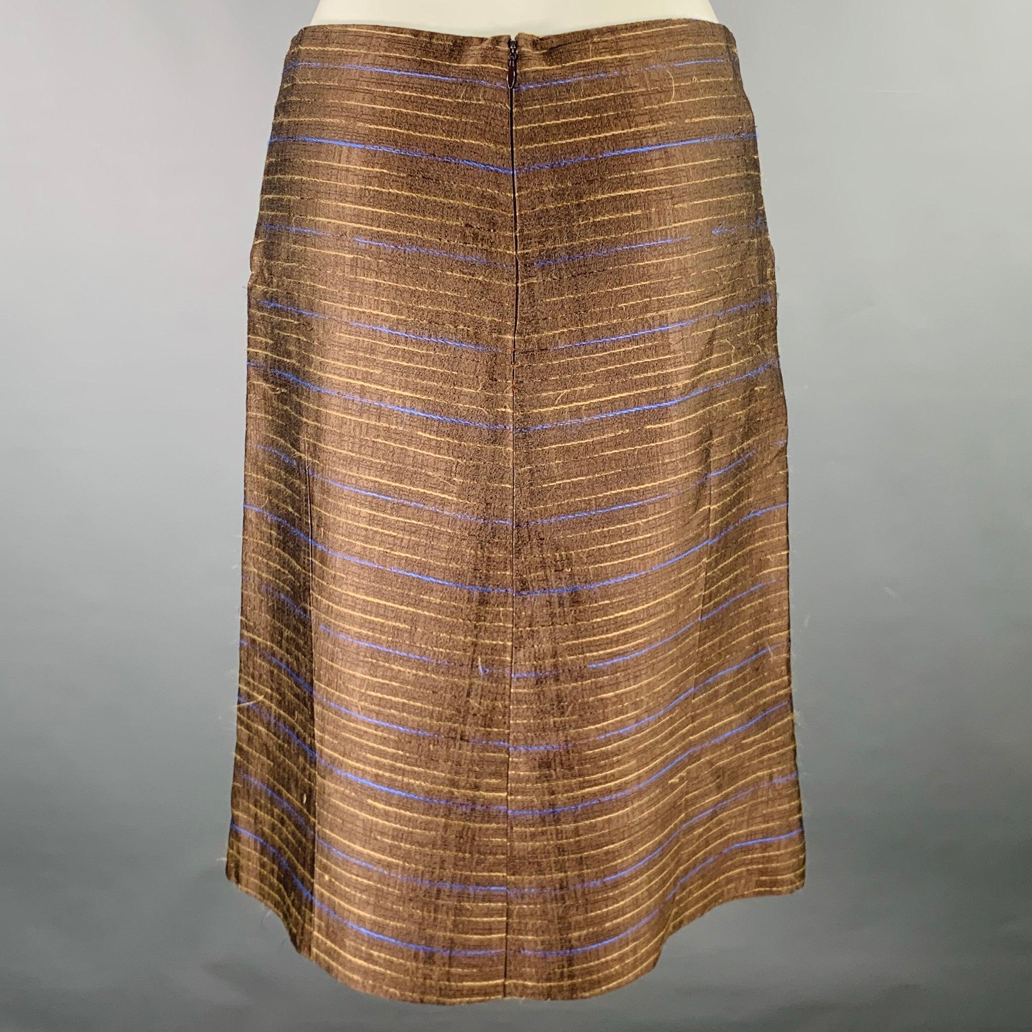 MARNI skirt
in a brown silk fabric featuring an A-line style, blue and tan stripes, and side zipper closure. Made in Italy.Very Good Pre-Owned Condition. Minor signs of wear. 

Marked:  
 38 

Measurements: 
  Waist: 27 inches Hip: 36 inches Length: