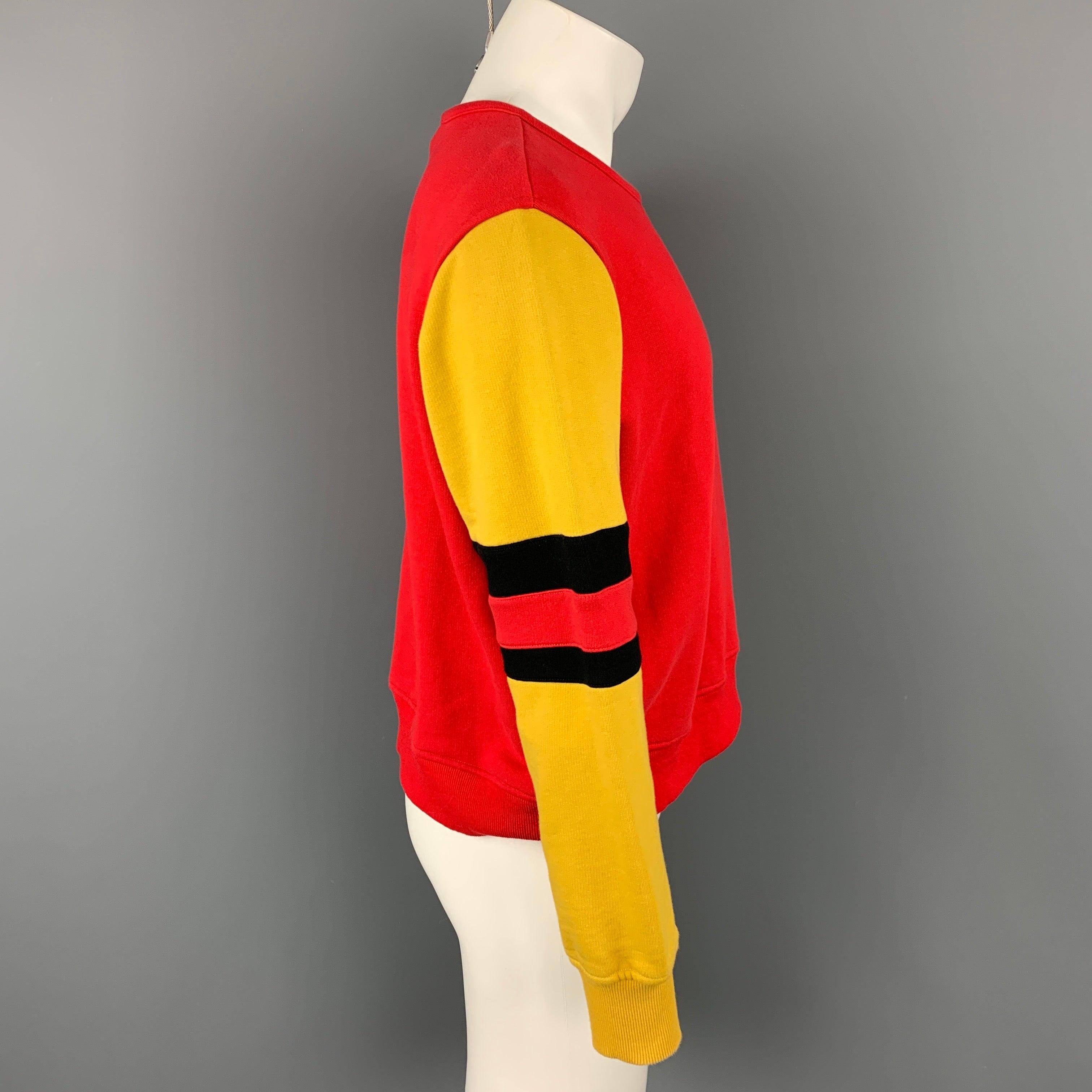 MARNI pullover comes in a red & mustard color block cotton featuring a ribbed hem and a loose neck. Made in Italy.Very Good
Pre-Owned Condition. 

Marked:   48 

Measurements: 
 
Shoulder: 21 inches  Chest: 46 inches  Sleeve: 25 inches  Length: 22