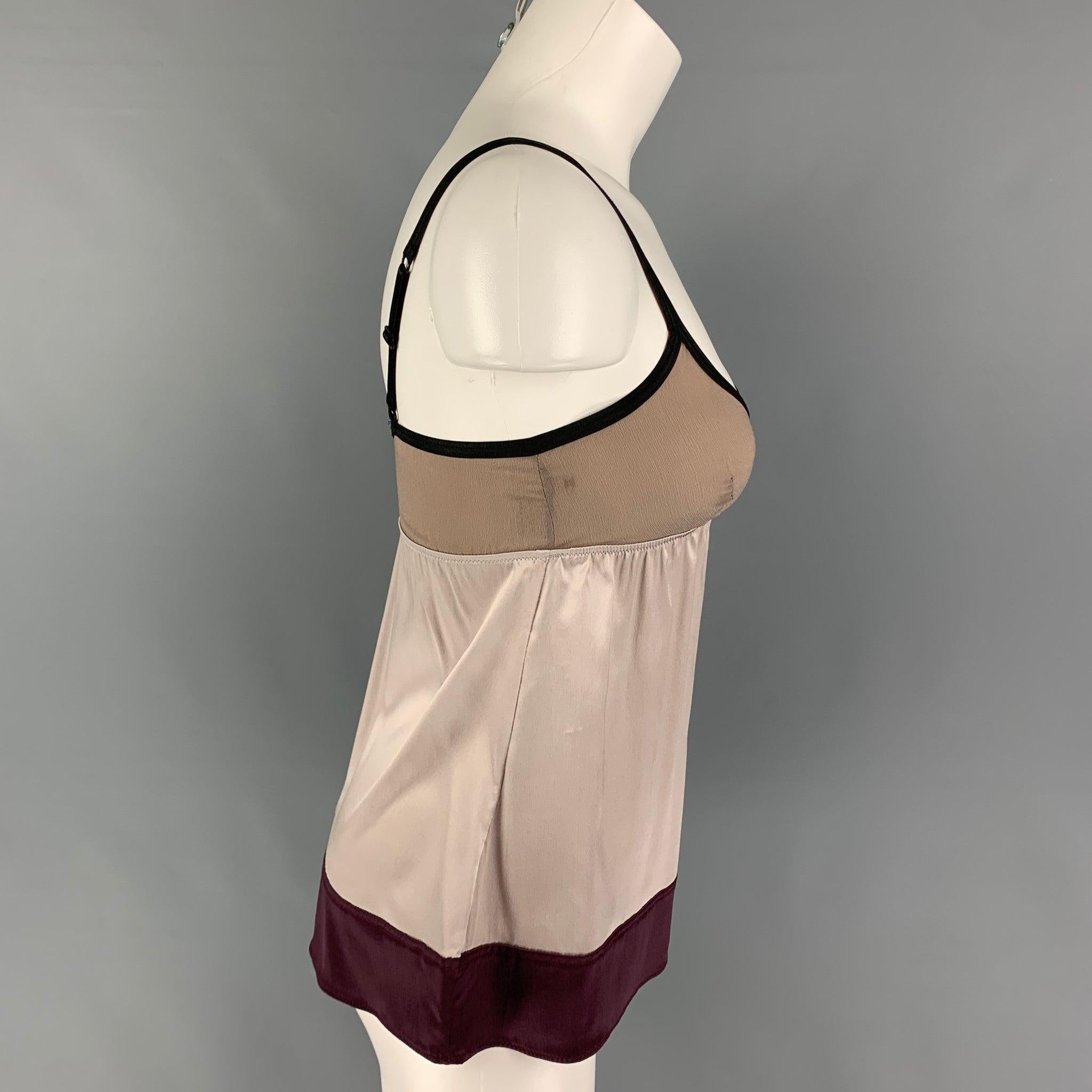 MARNI top comes in a silver & purple color block silk featuring spaghetti straps.
Very Good
Pre-Owned Condition. 

Marked:   II 

Measurements: 
  Bust: 26 inches  Length: 15.5 inches 
  
  
 
Reference: 120010
Category: Dress Top
More Details
   