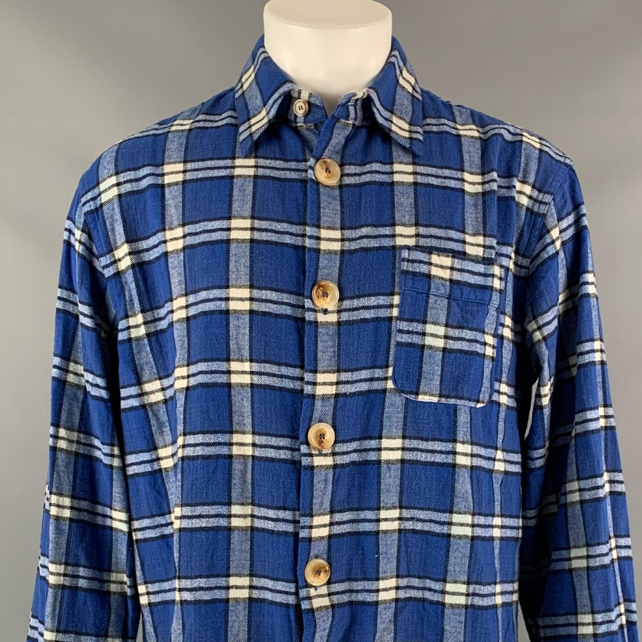 MARNI long sleeve shirt comes in a blue & white brushed plaid cotton featuring a oversized fit, patch pocket, spread collar, and a buttoned closure. Made in Italy.

Very Good Pre-Owned Condition.
Marked: 46

Measurements:

Shoulder: 20 in.
Chest: 46