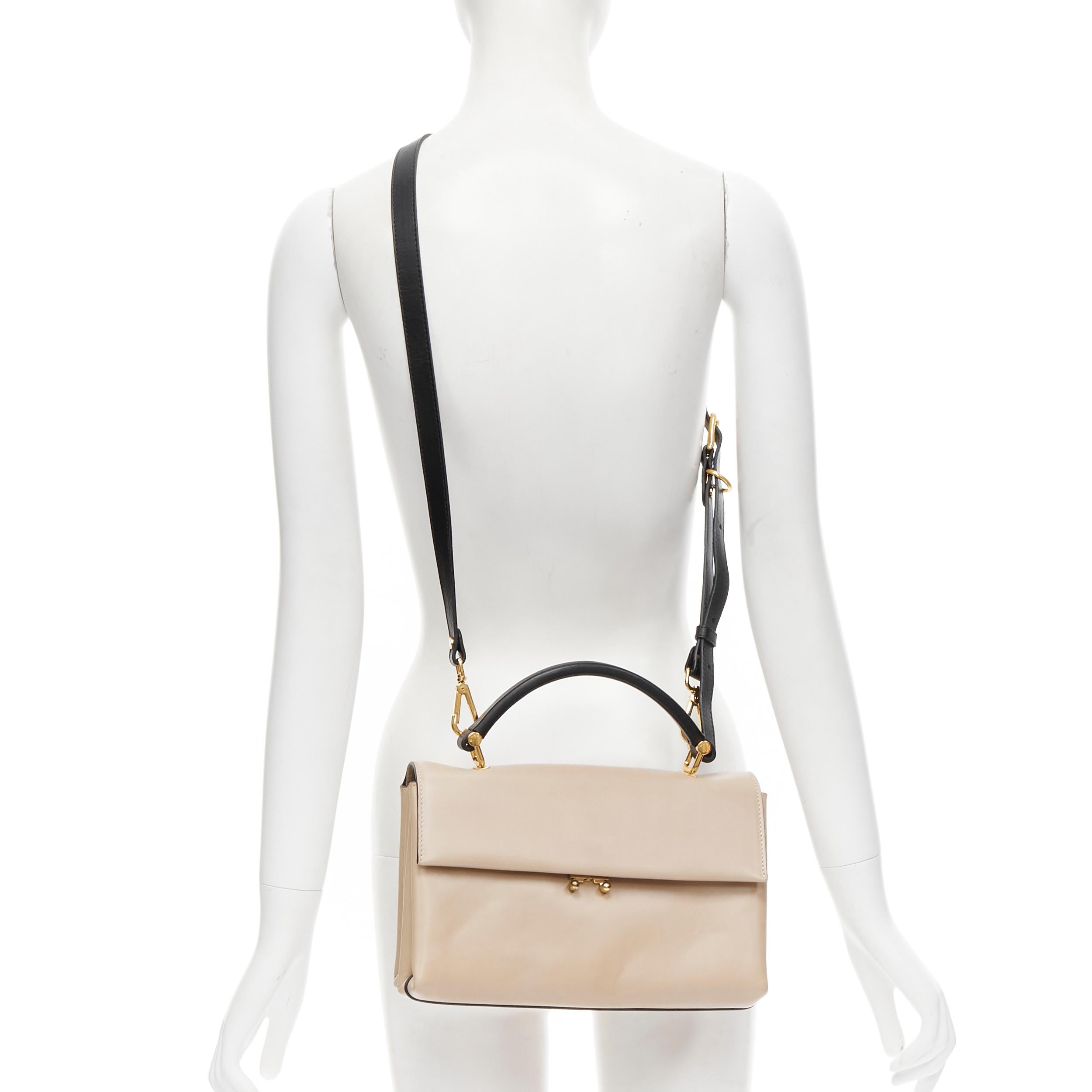 MARNI stone grey black clasp lock flap top handle crossbody satchel bag 
Reference: CELG/A00028 
Brand: Marni 
Model: Clasp lock top handle crossbody 
Material: Leather 
Color: Grey 
Pattern: Solid 
Closure: Lock 
Extra Detail: Gold tone push clasp
