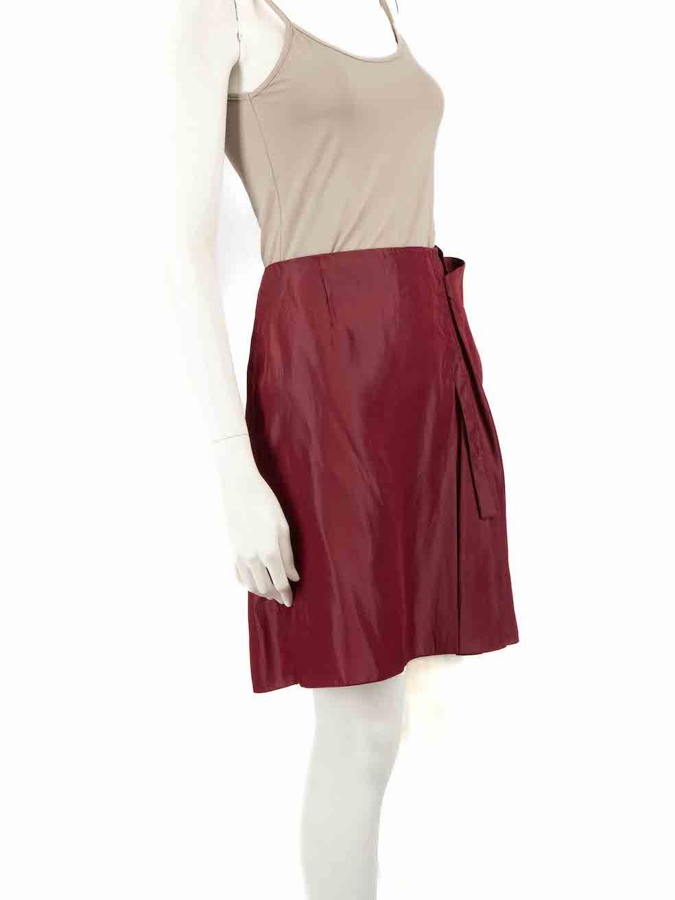 CONDITION is Very good. Minimal wear to skirt is evident. Tiny plucks to the weave and a small mark near the back hem on this used Marni designer resale item.
 
 
 
 Details
 
 
 Summer 2010
 
 Burgundy
 
 Synthetic
 
 Slip skirt
 
 Mini
 
 Side