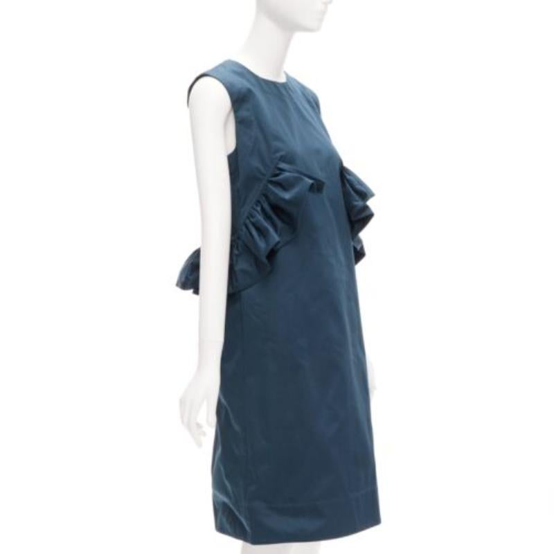 MARNI teal blue ruffle waist round neck cocktail dress IT38 XS
Reference: CELG/A00287
Brand: Marni
Material: Cotton
Color: Green, Blue
Pattern: Solid
Closure: Zip
Lining: Green Fabric
Extra Details: Back zip with geometric zipper head.
Made in: