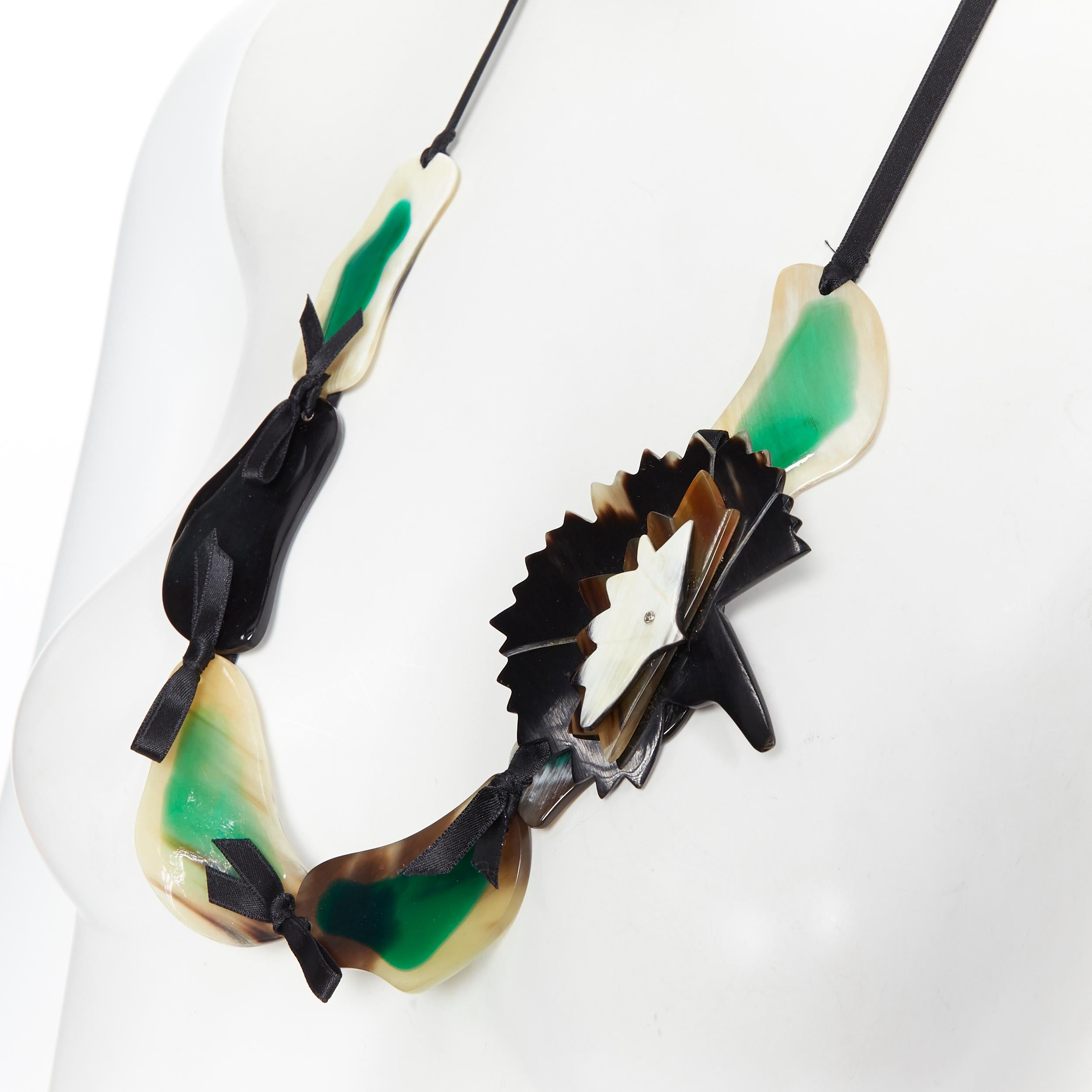 MARNI tribal green mixed resin ribbon tie detachable brooch statement necklace
Brand: Marni
Designer: Marni
Model Name / Style: Statement necklace
Material: Resin
Color: Multicolour
Pattern: Solid
Closure: Tie
Made in: Italy

CONDITION: 
Condition: