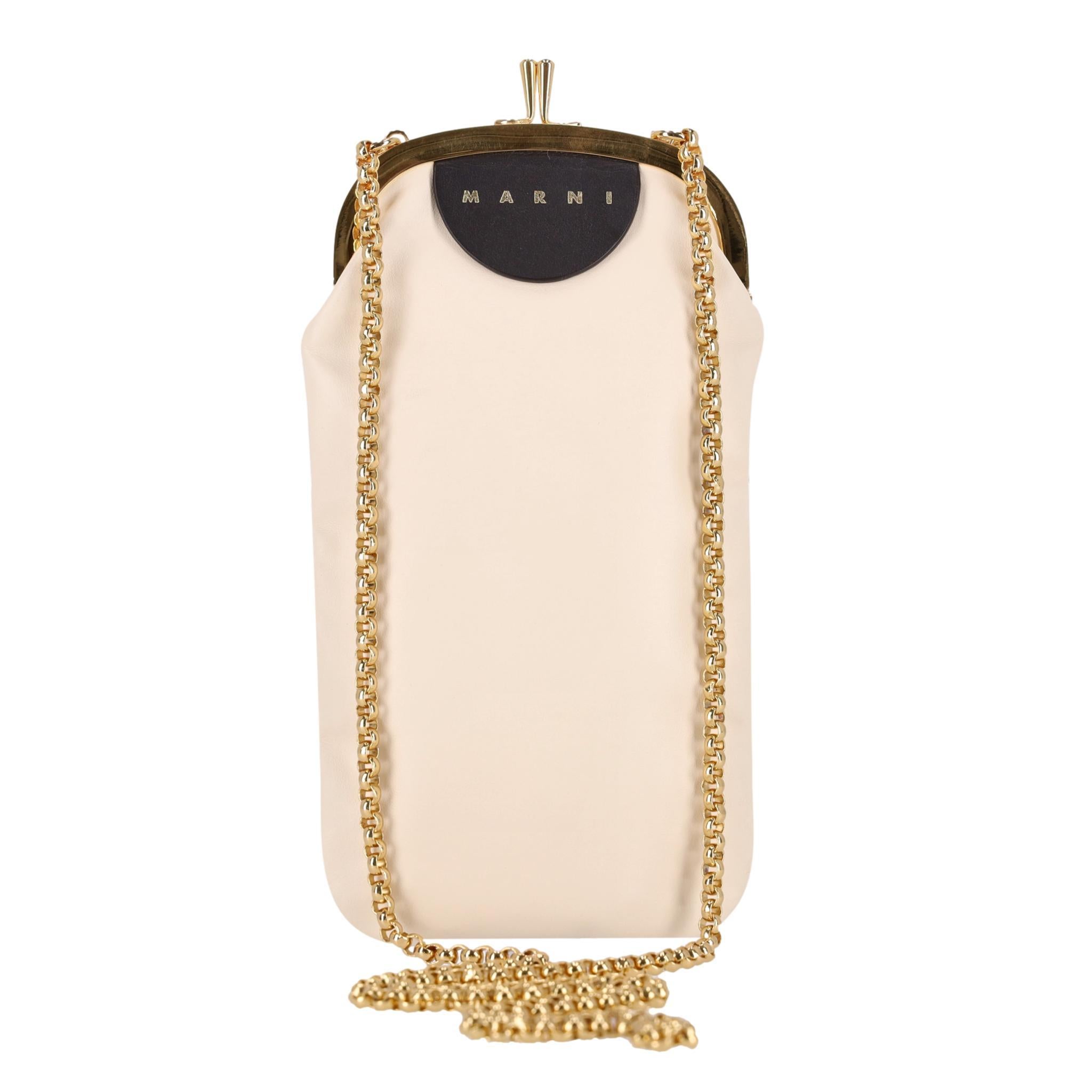 Marni Two-Tone Leather Phone Pouch/Bag On A Chain

Phone pouch crafted from ivory leather to the front and contrasting blue leather to the back.

Featuring gold 'Marni' signature on the black leather to the top and gold clasp closure.

Featuring