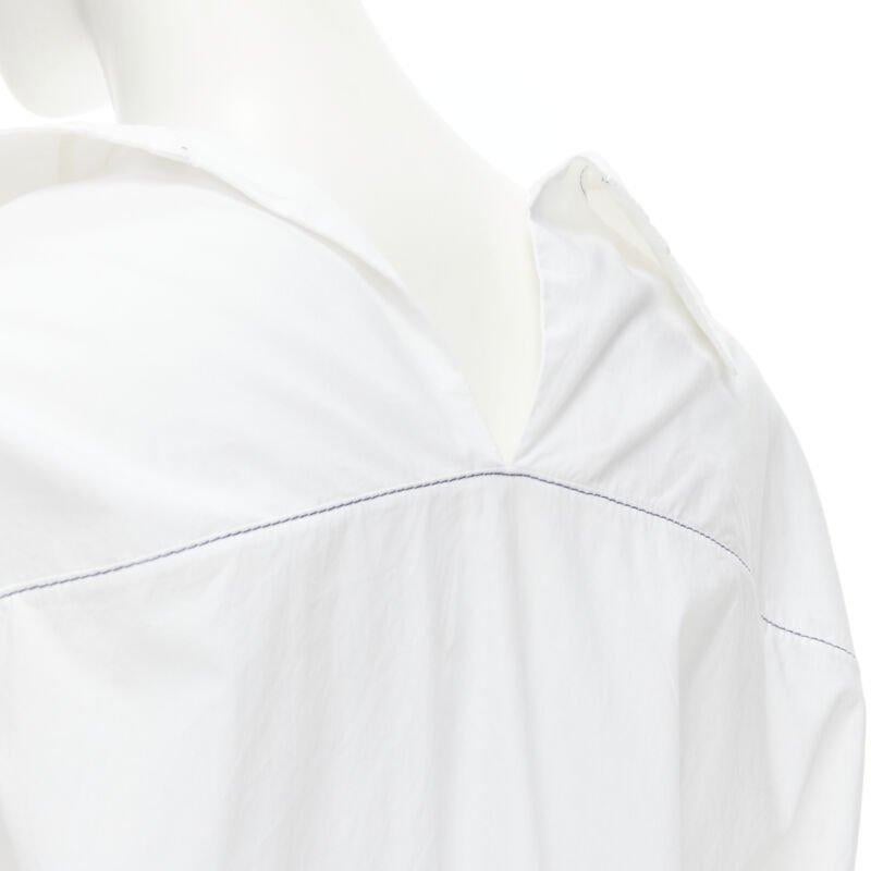 MARNI white cotton blue stitching deconstructed collar oversized shirt IT36 XS
Reference: CELG/A00189
Brand: Marni
Material: Cotton
Color: White
Pattern: Solid
Closure: Button
Extra Details: Blue stitching. Oversized fit.
Made in: