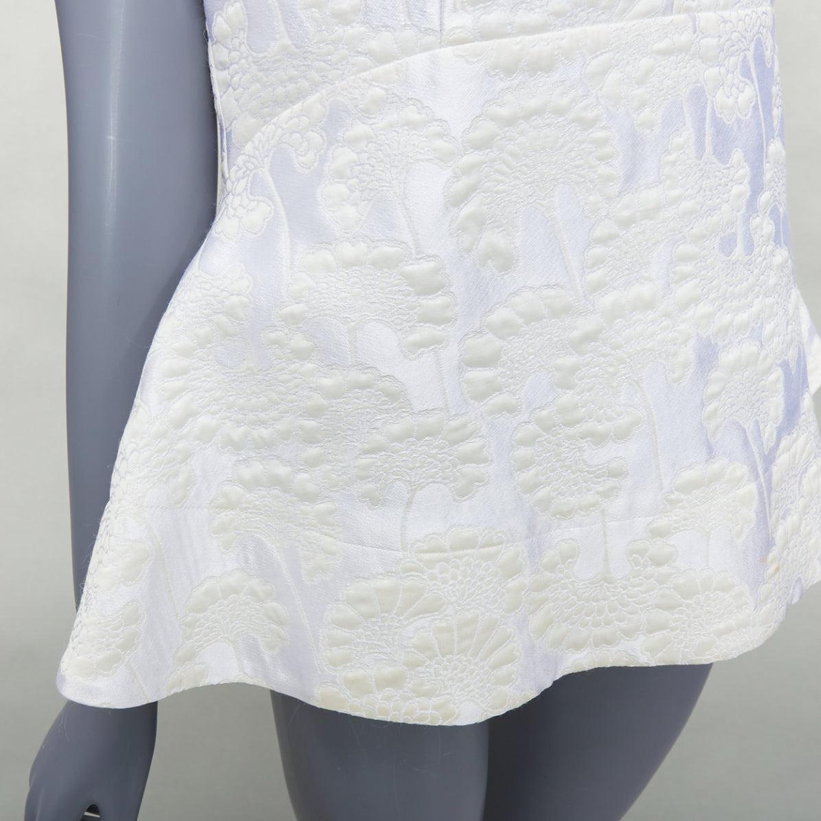 MARNI white cream floral jacquard round neck peplum top IT42 M
Reference: WECN/A00021
Brand: Marni
Material: Polyester, Blend
Color: White, Cream
Pattern: Floral
Closure: Zip
Extra Details: Back zip.
Made in: Italy

CONDITION:
Condition: Very good,