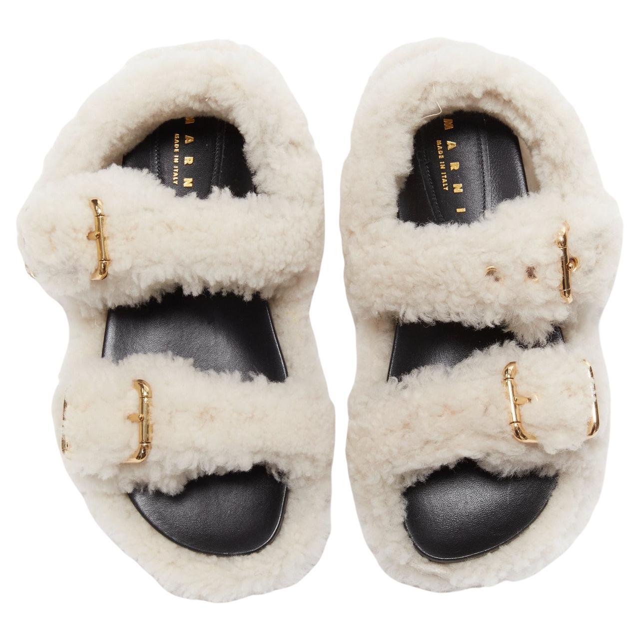 MARNI white shearling gold buckles double strap black leather lined flat sandals For Sale