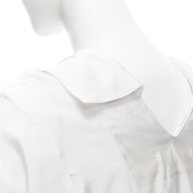 MARNI white viscose cowl neck curved seam slit pocket top IT38 XS
Reference: CELG/A00136
Brand: Marni
Material: Viscose, Polyester
Color: White
Pattern: Solid
Extra Details: Slit front pockets.
Made in: Italy

CONDITION:
Condition: Good, this item