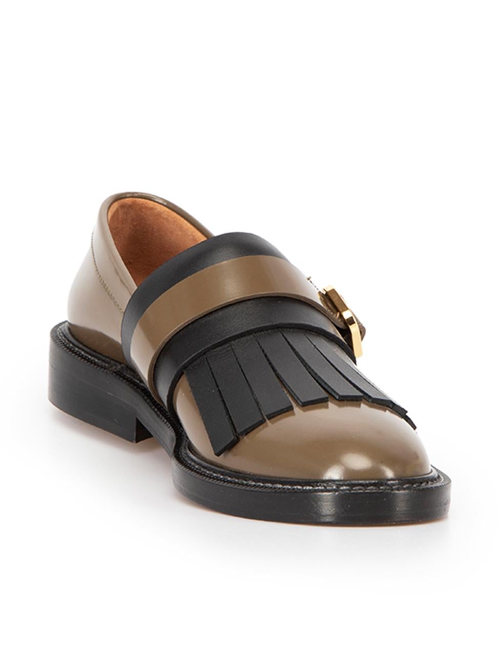 CONDITION is Never Worn. No visible wear to shoes is evident on this used Marni designer resale item. These shoes come with original dust bag.



Details


Khaki

Leather

Black leather wide fringe

Buckle vamp strap

Almond-toe

Low heel

Leather