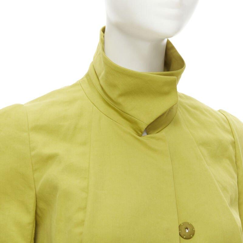 MARNI yellow silk lime yellow pleat seam short sleeve coat IT38 XS
Reference: CELG/A00155
Brand: Marni
Material: Cotton, Silk
Color: Yellow
Pattern: Solid
Closure: Snap Buttons
Extra Details: Pleat curved seams. Dual side seam pockets. Rounded