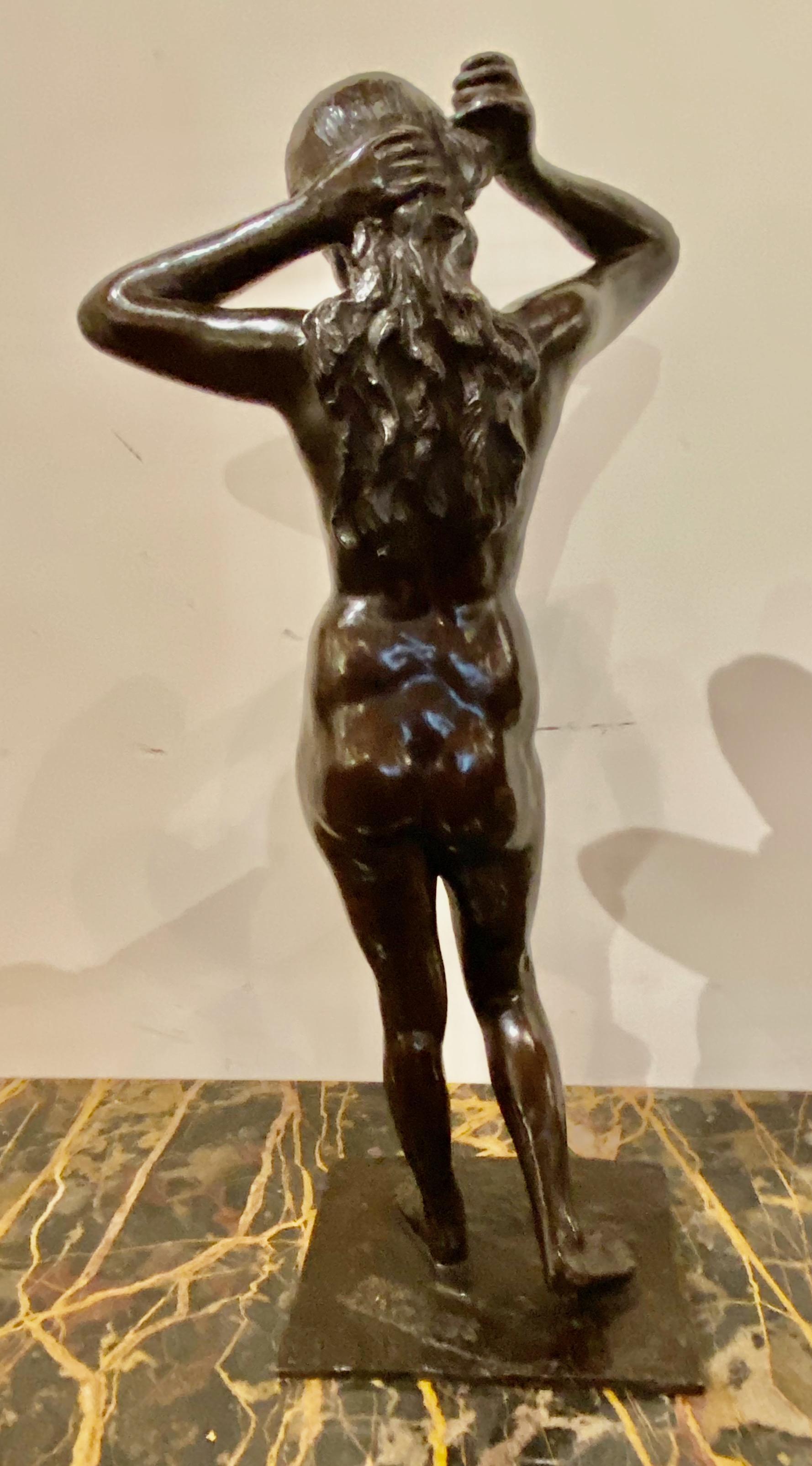 Bronze dancer, circa1930. Sculpture with black patina, by MARNIX D’HAVELOOSE (1885-1973). This classically interpreted nude dancer is rendered in an elegant Art Deco style. The signature is on the base. This is an important bronze in a Classic pose,