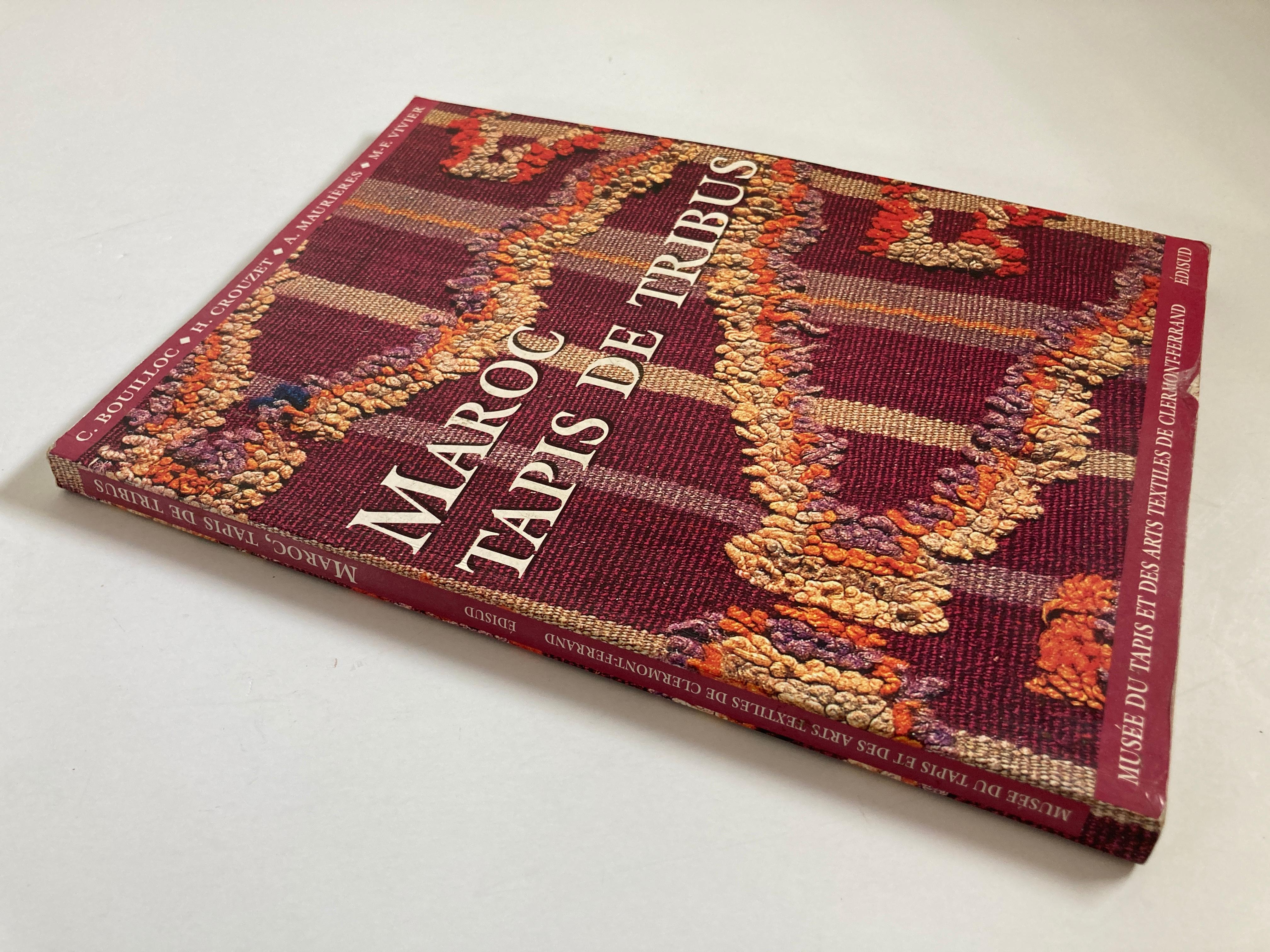 Maroc. Tapis de tribus (French) Paperback 
Moroccan Tribal Rugs
Language: French
Maroc Tapis De Tribus
C.BOULLOC / H.CROUZET / A.MAURIERES / M-F VIVIER
Published by Edisud, 2001
173 + 2 pages, illustrated in color plates. 
Photography by Eric